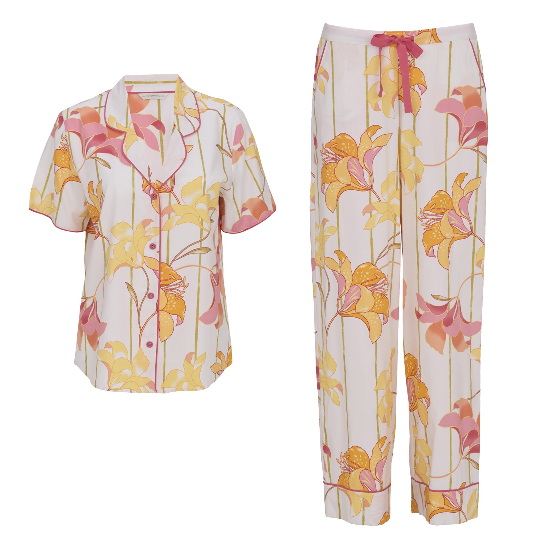 Floral pyjama set laid flat with short sleeve collared top and matching wide-leg pants in white with yellow and coral lily print