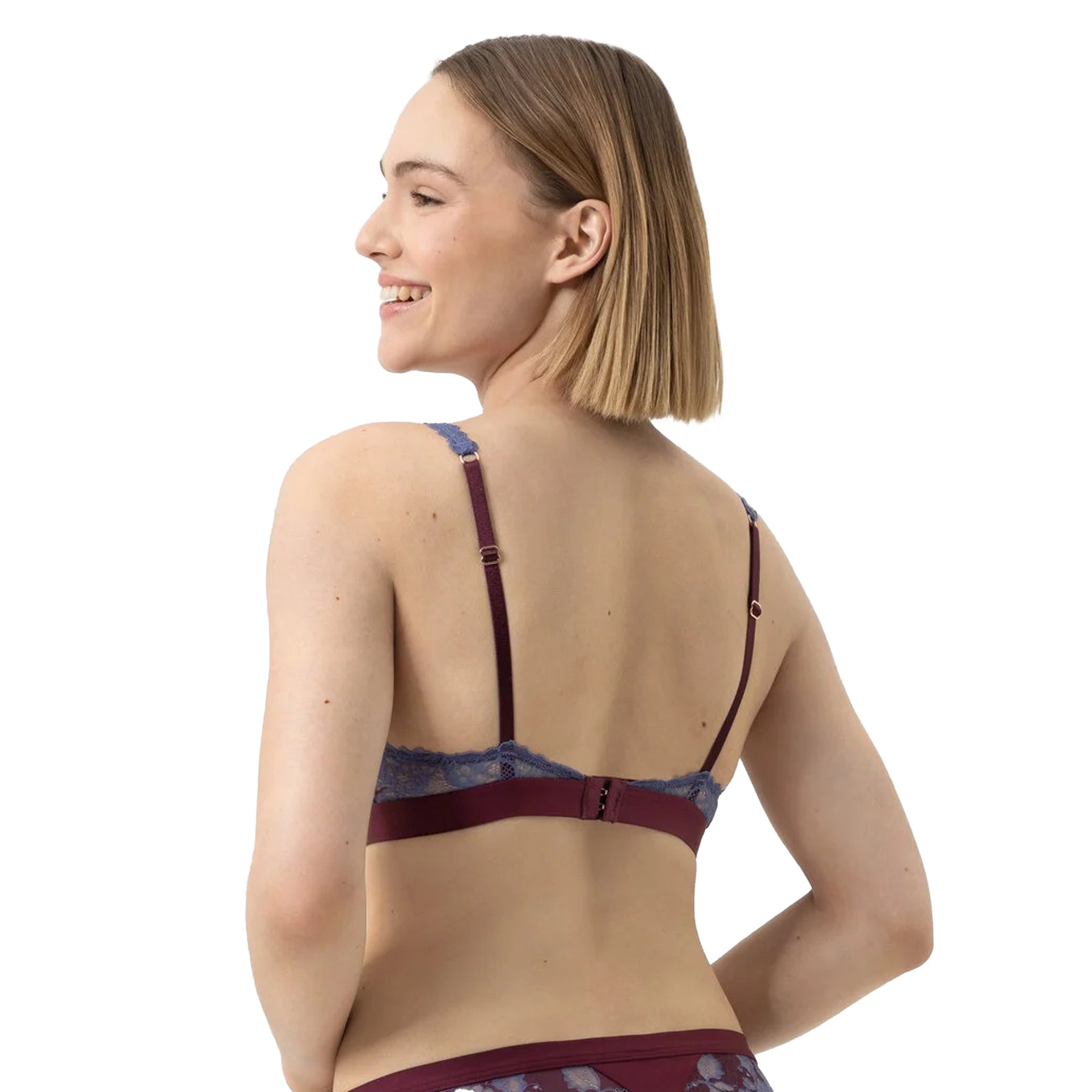 Burgundy bralette with blue lace overlay and scalloped edges, angled front view on model