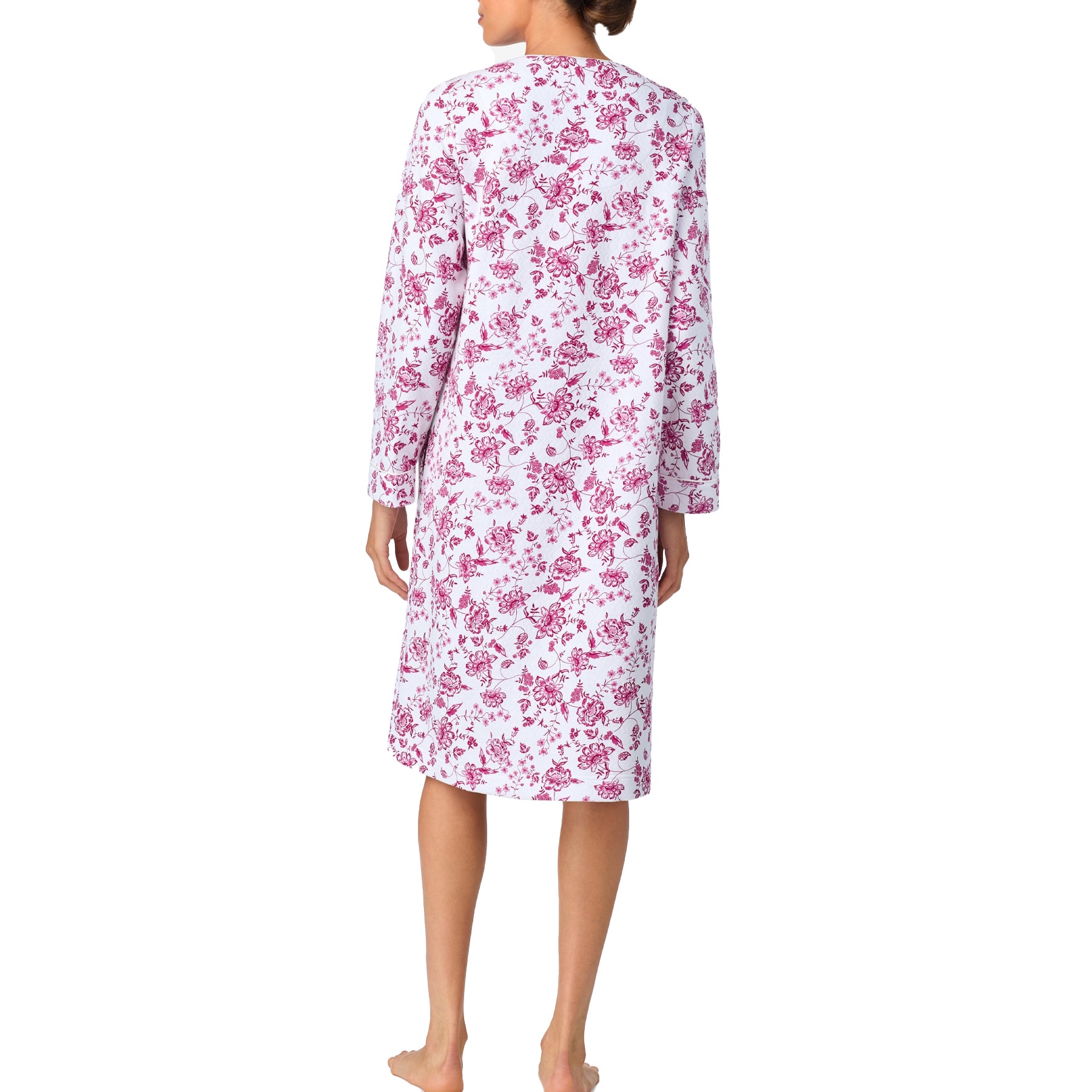 Side view of a floral cotton nightgown with long sleeves and front zipper, in pink and white.