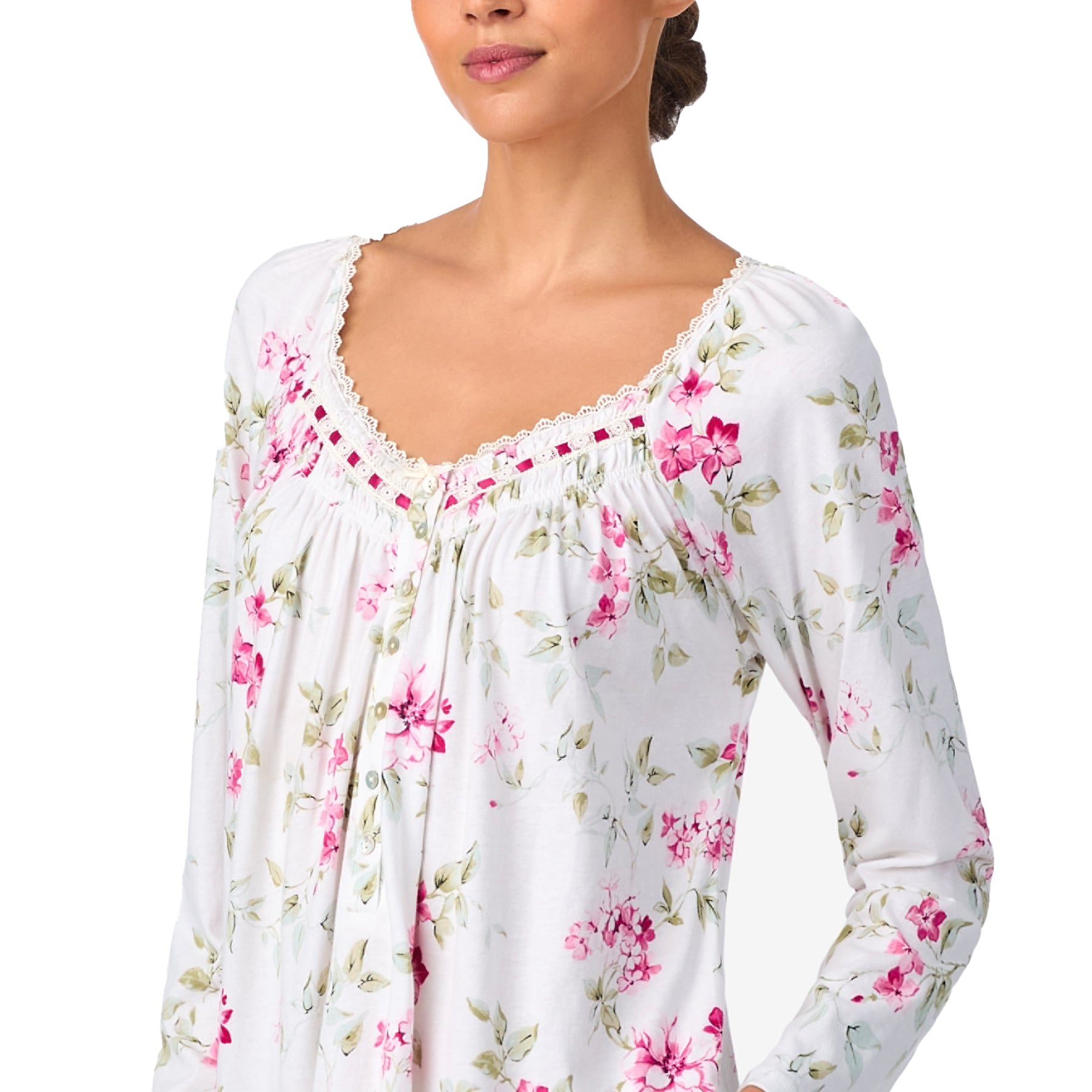 Close-up of floral print nightgown showing lace-trim neckline and delicate gathers.