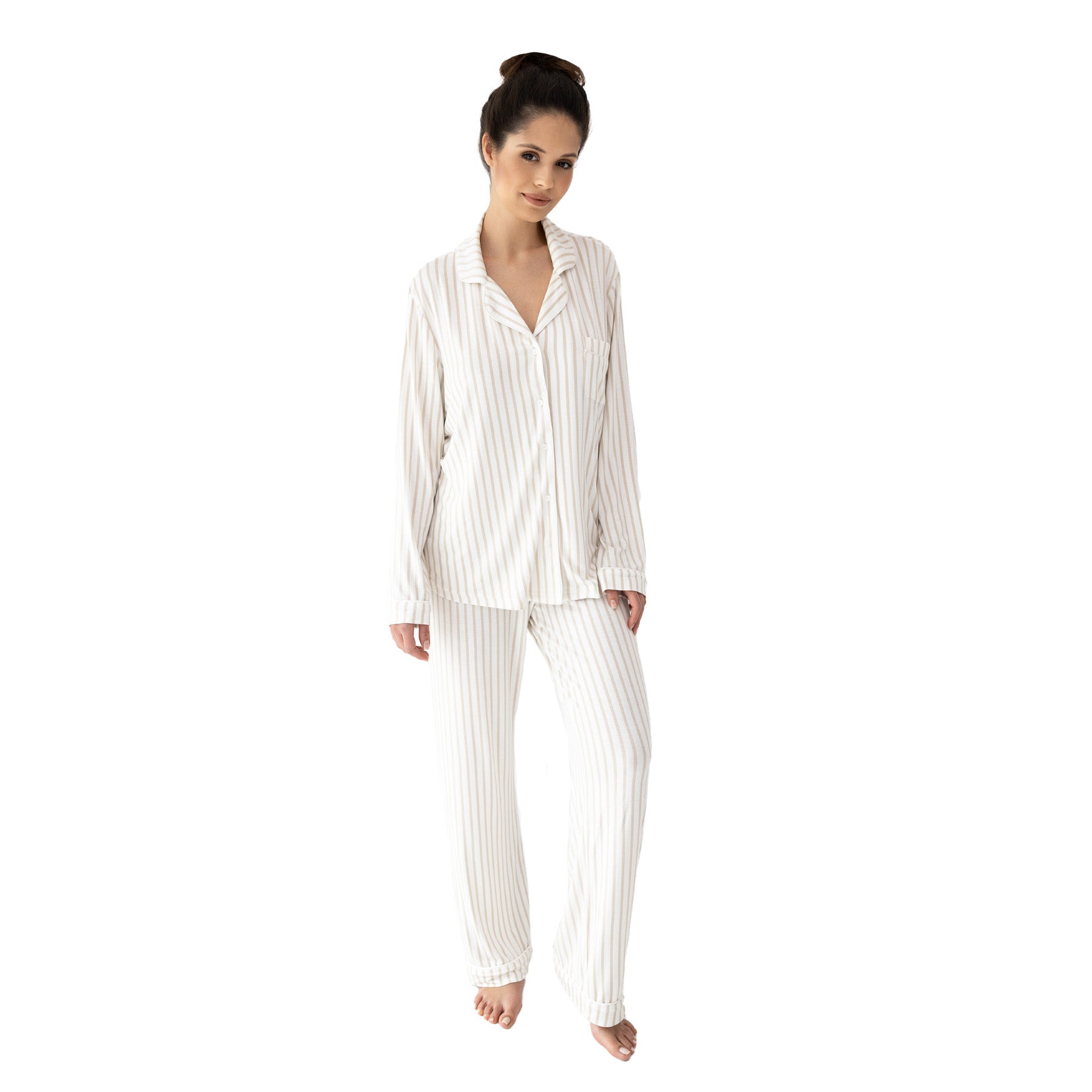 Women’s ivory and beige striped long sleeve pyjama set with button-down top and relaxed pants, full body on white background