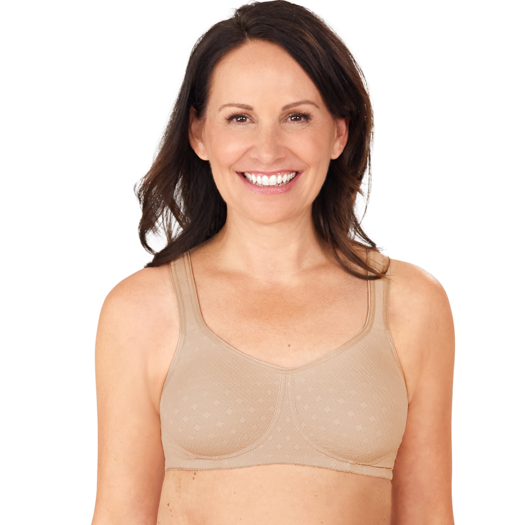 Woman wearing Amoena Tiana Wireless Soft Bra in Nude – wire-free post-surgery bra with molded cups and gentle lift for natural shape and comfort.