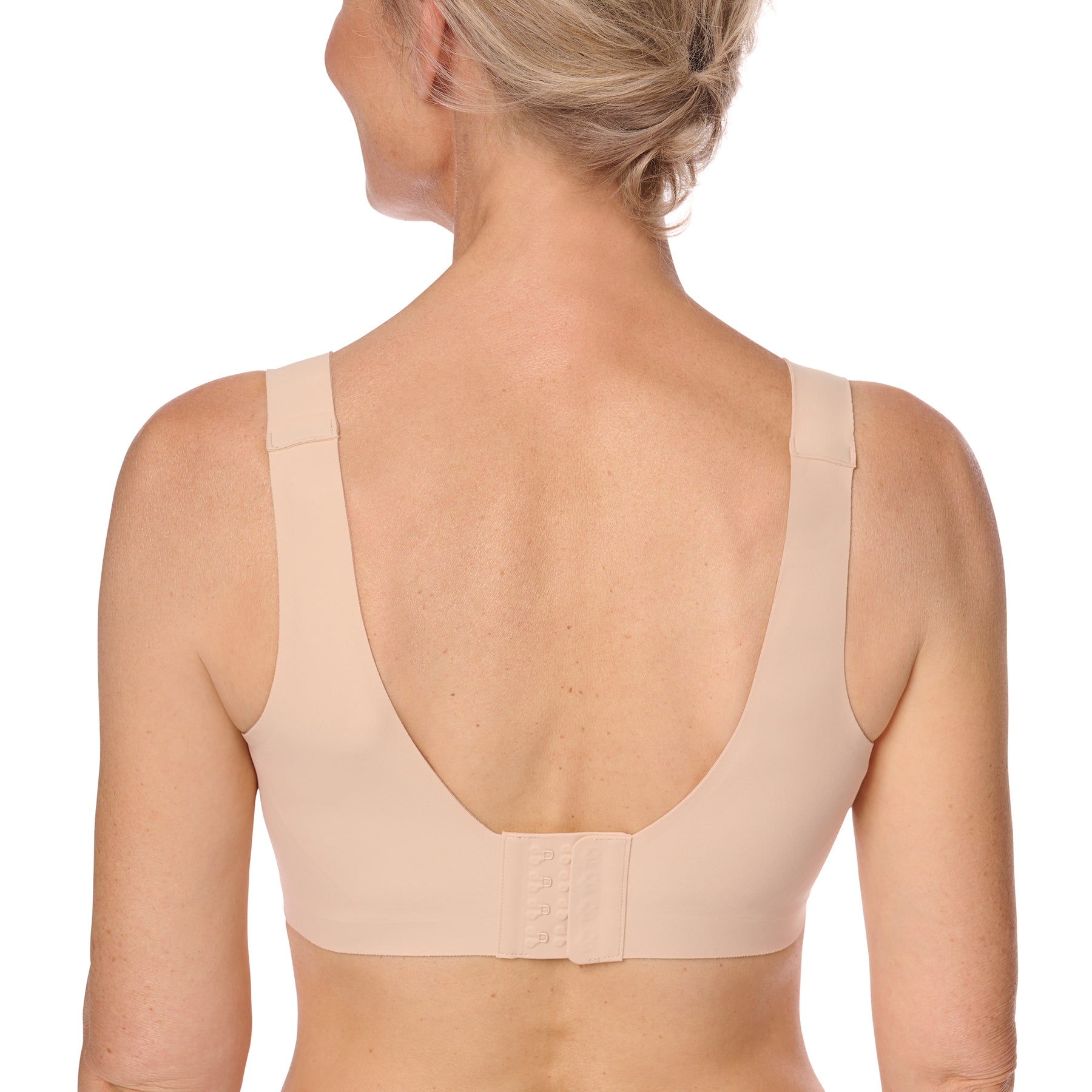 Back of Amoena Linda Seamless Bra in Sand – wide scoop back with adjustable hook-and-eye closure.