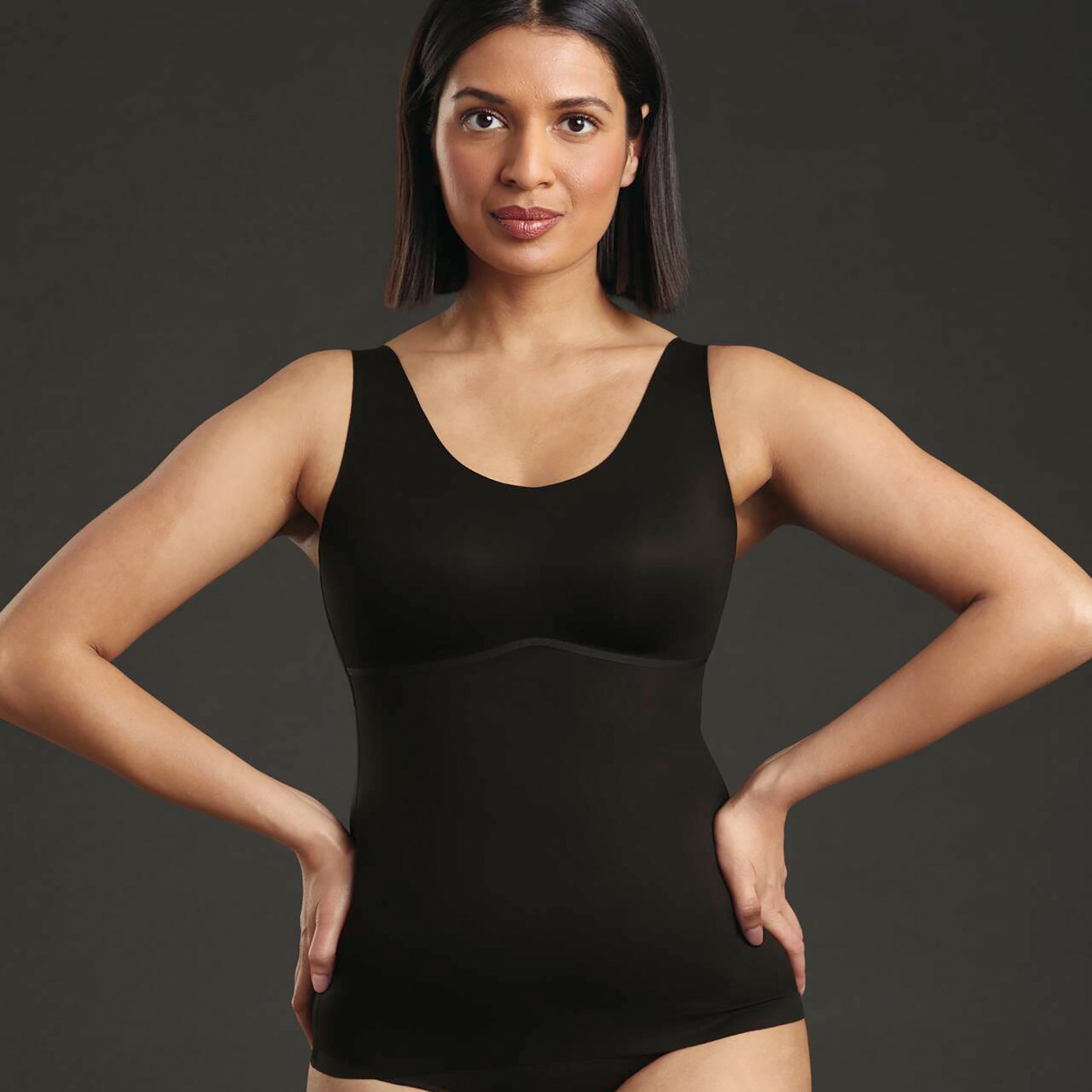 Front view of model wearing ANITA 0654 Essential Tank with Shelf Bra in Black.