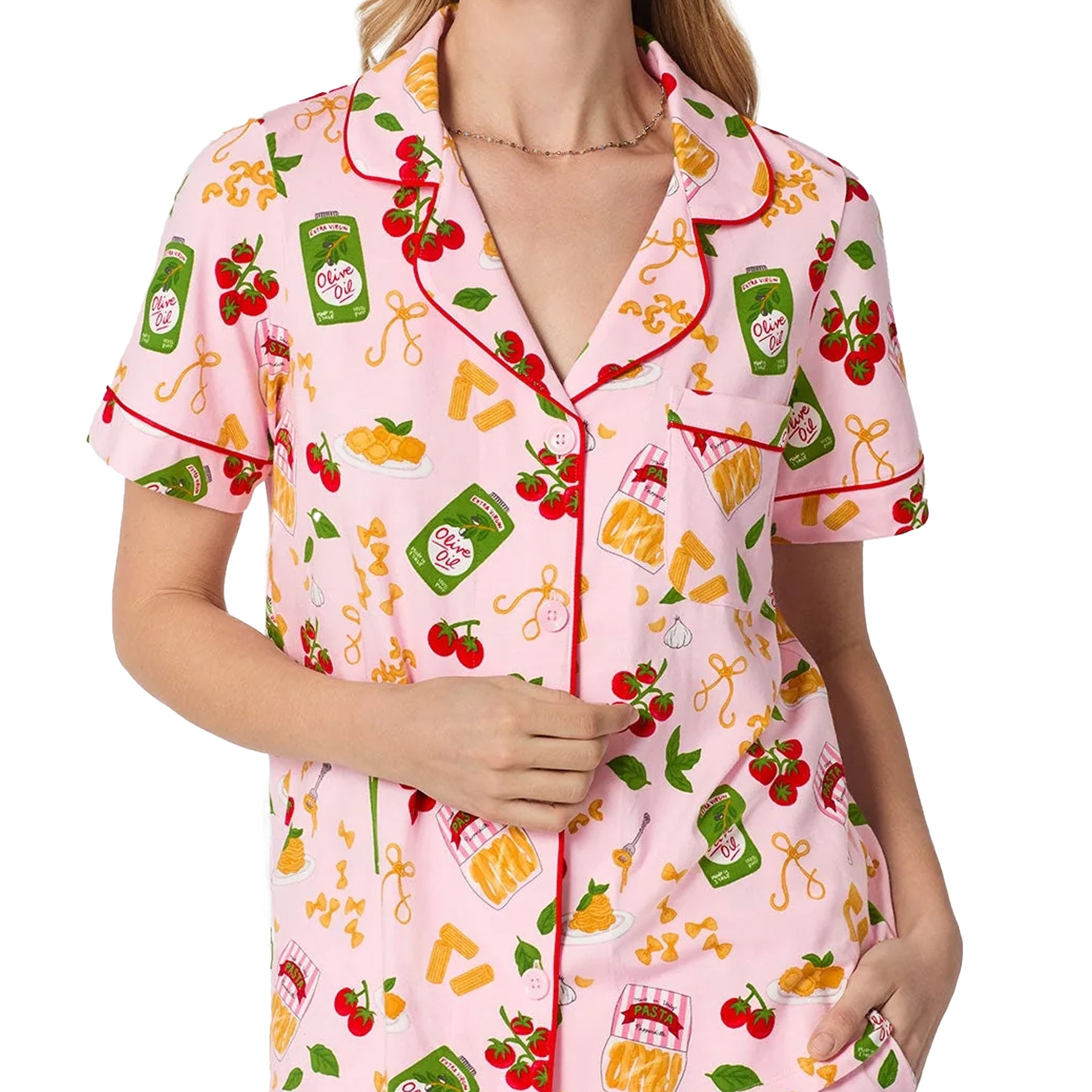 Close-up of Bed Head pajama shirt featuring whimsical pasta, tomato, and olive oil print with pink piping details.