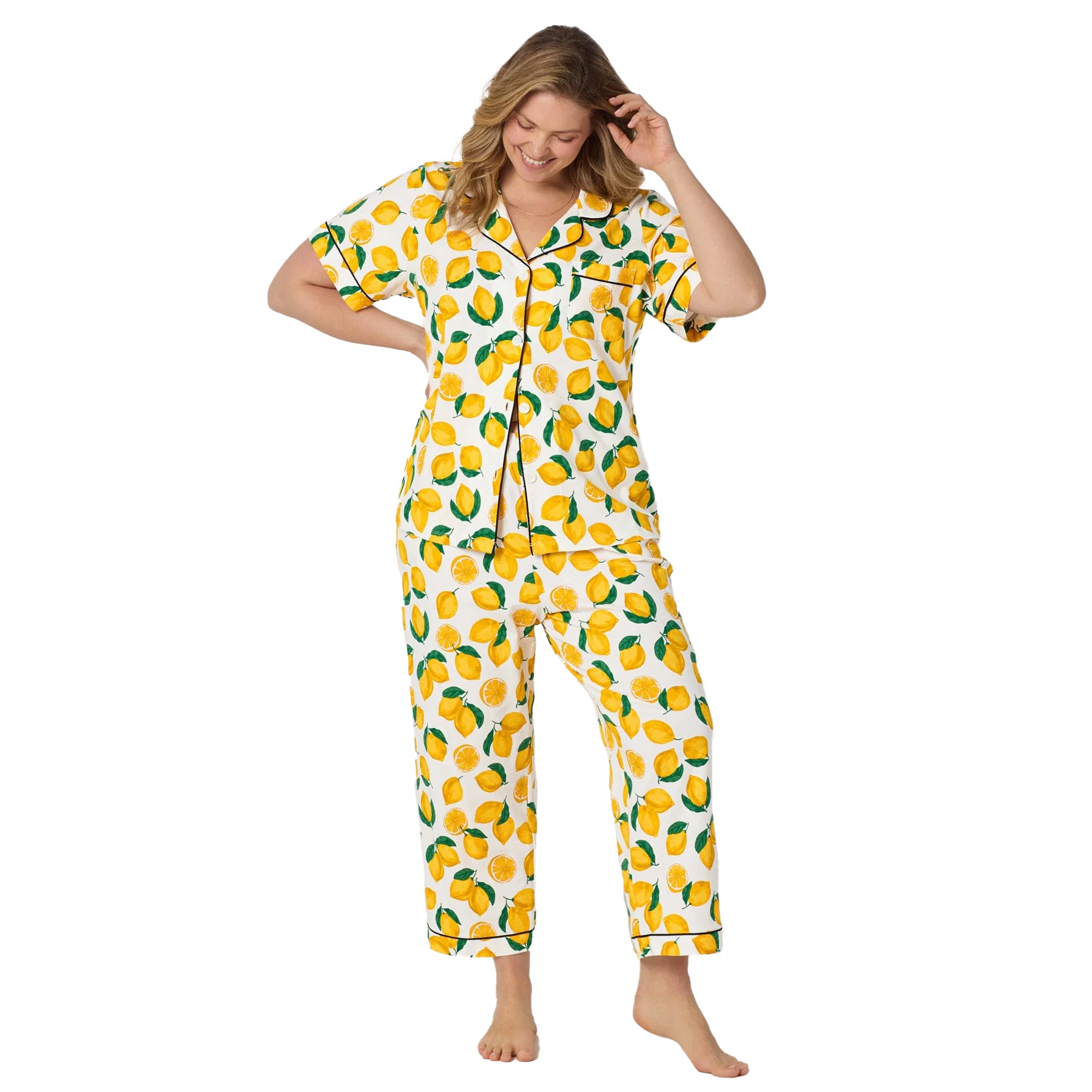 Plus size lemon print pyjama set with soft fabric, playful citrus pattern, and relaxed lounge silhouette.