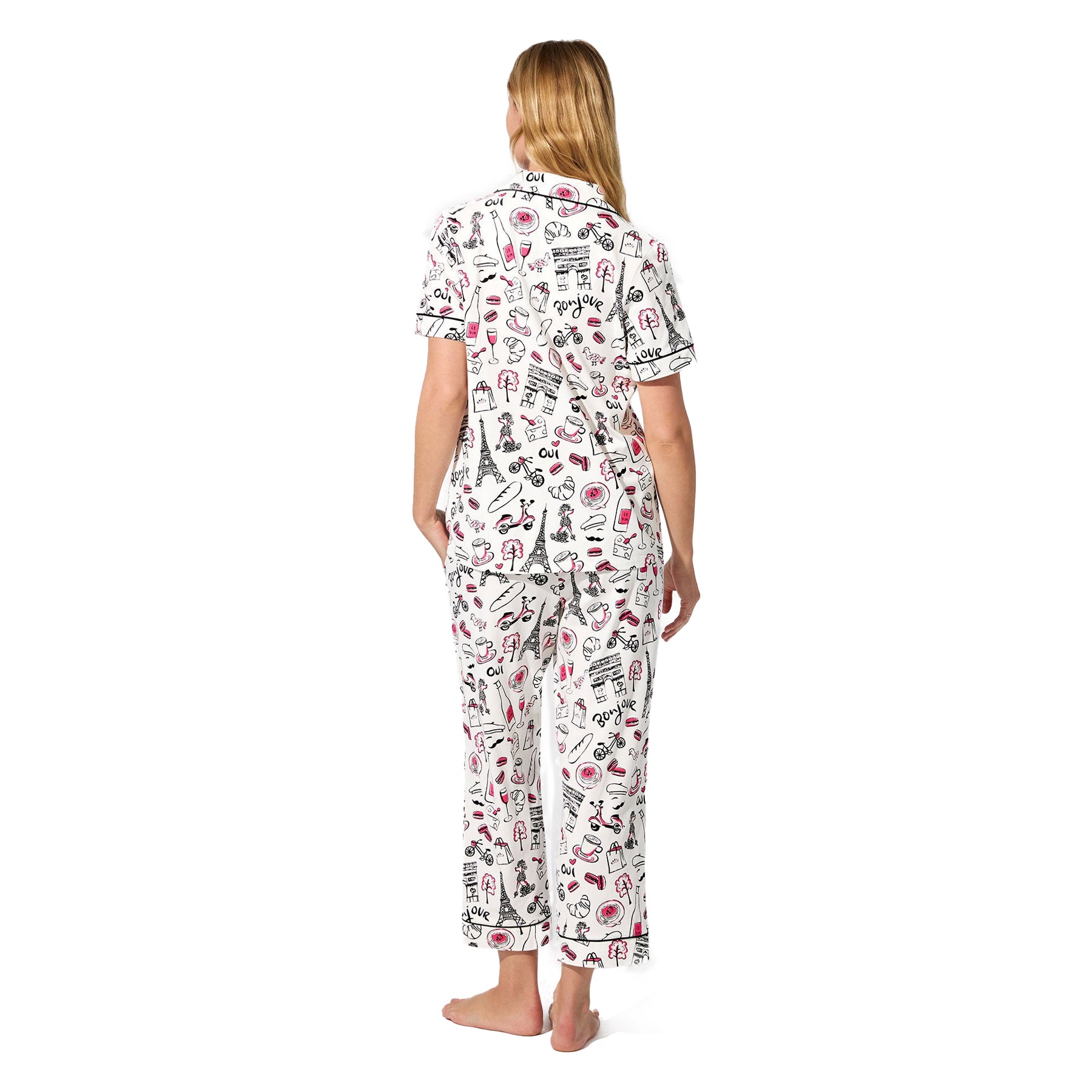 Back view of straight-size model wearing Paris-themed pajama set with cropped pants and illustrated French icons.