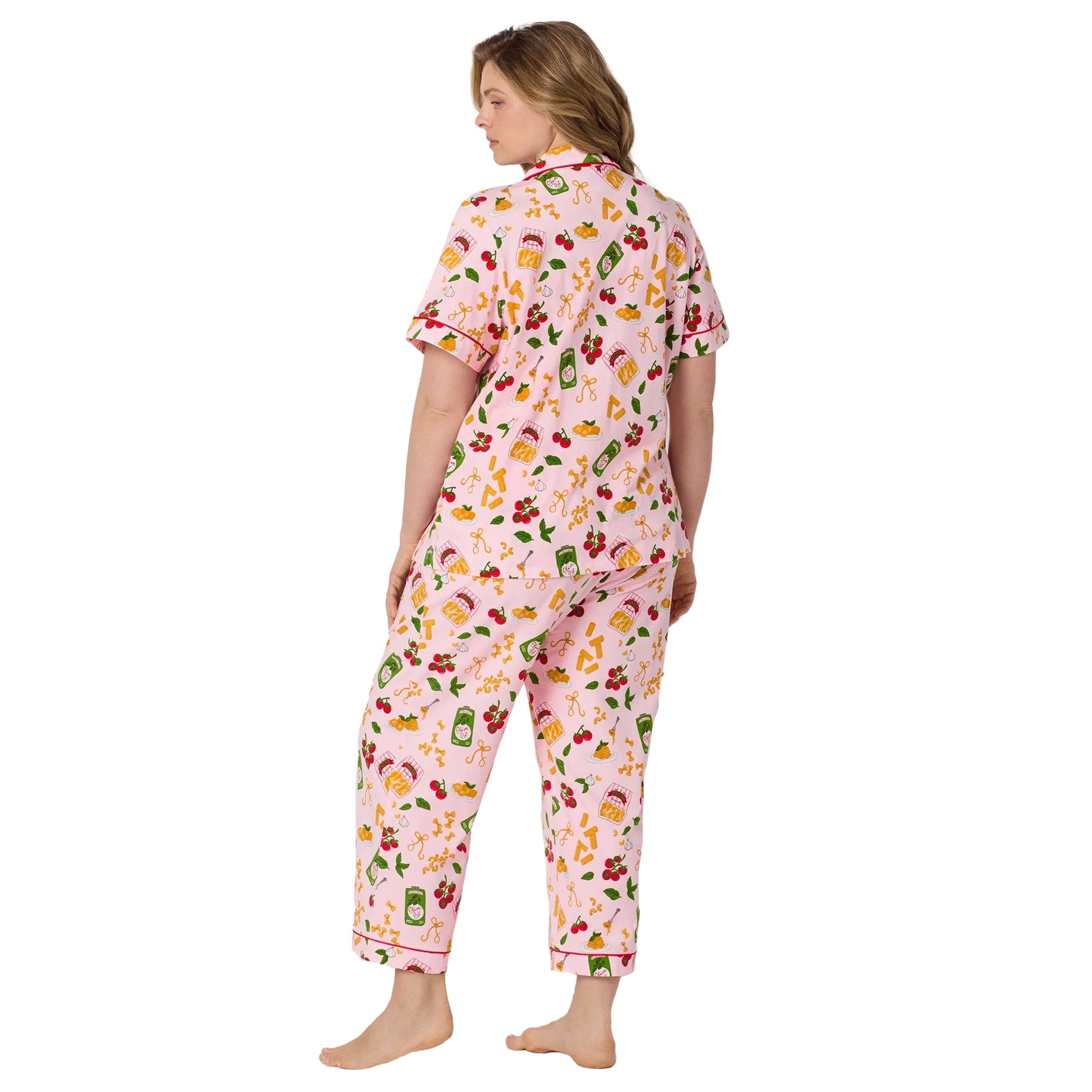 Back angled view of Bed Head pajama set featuring fun pasta, olive oil, and tomato print on pink fabric.