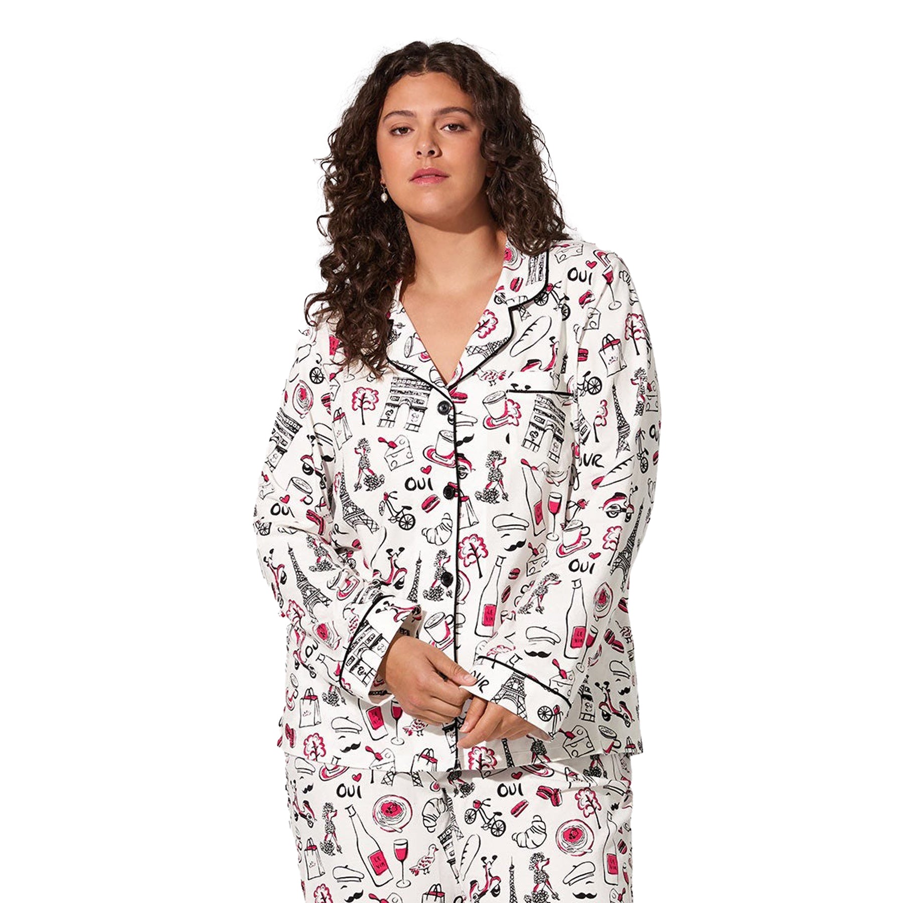 Close-up front view of plus-size model wearing Paris-themed pyjama set with black piping