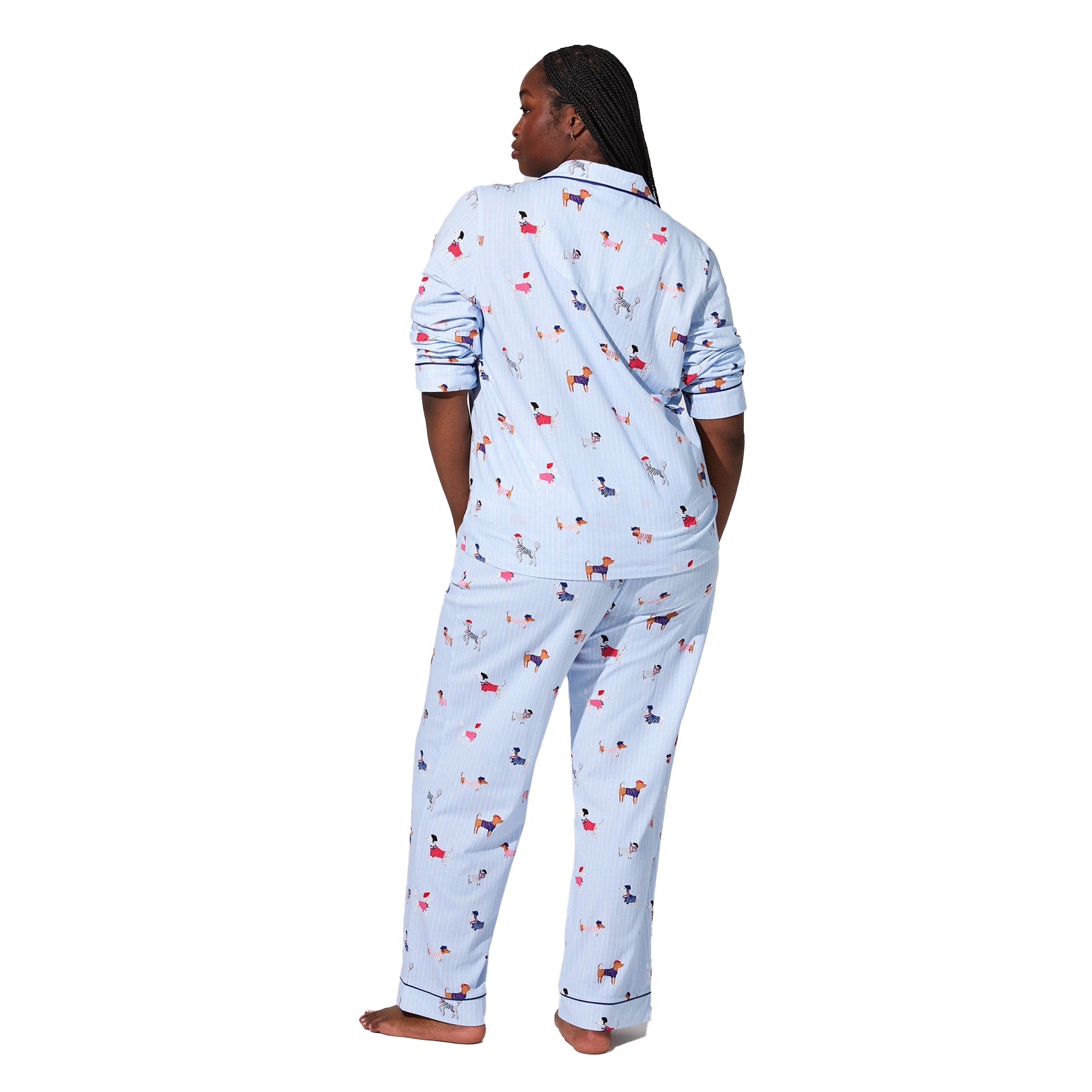 Light blue dog-print pyjama set with navy piping, back view on model