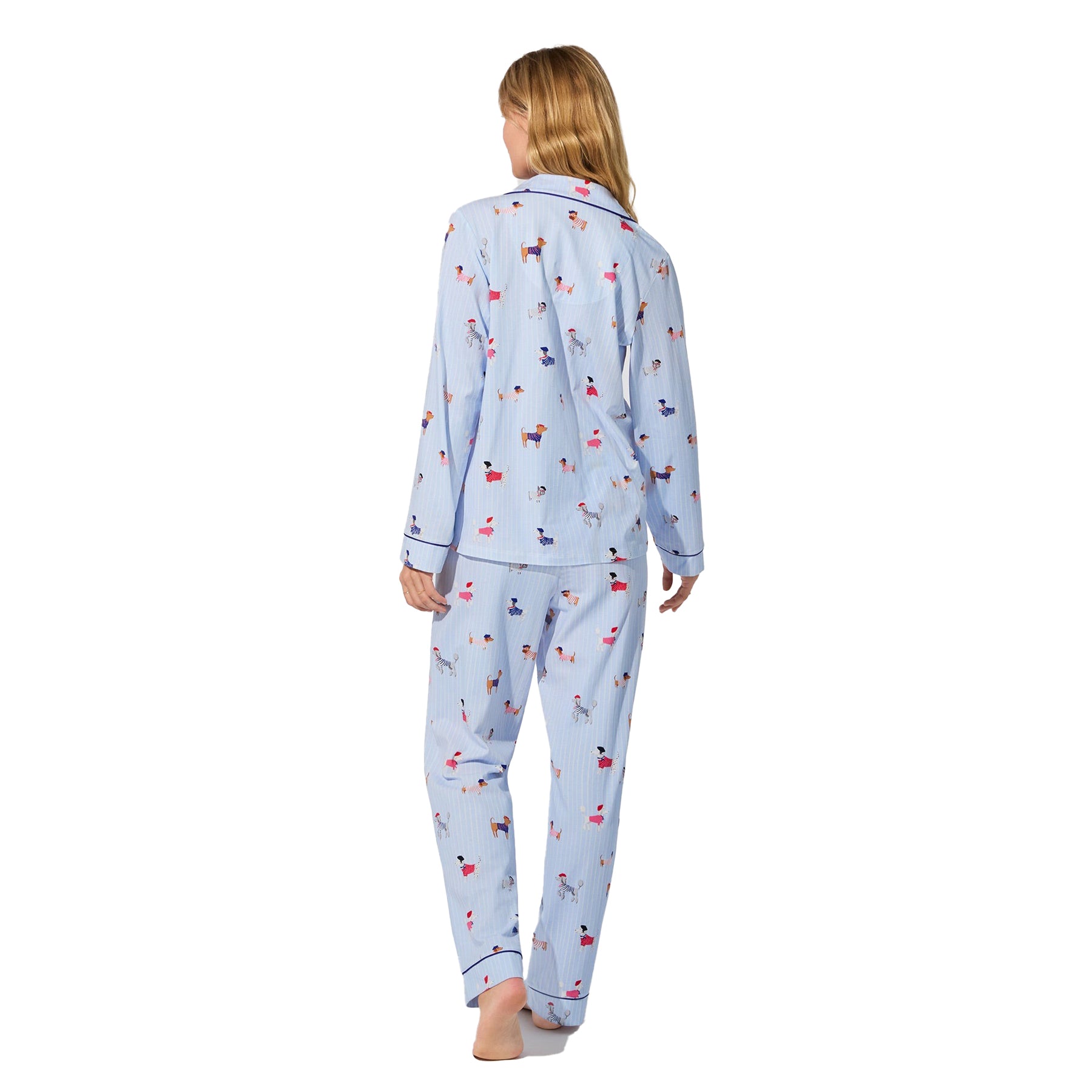 Light blue dog-print pyjama set with navy piping, back view on model