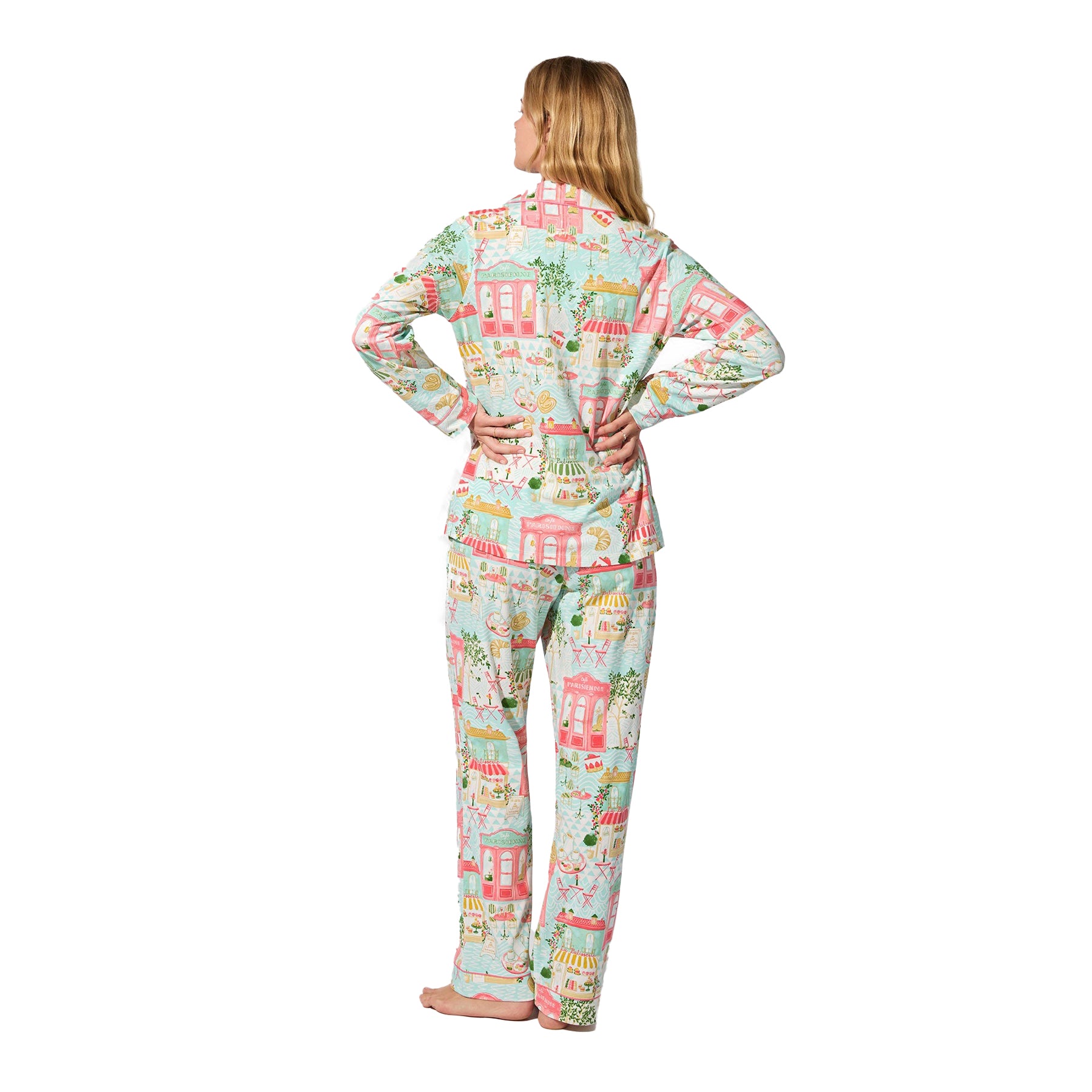 Light aqua Parisian city scene print pyjama set with pink piping, back view on model