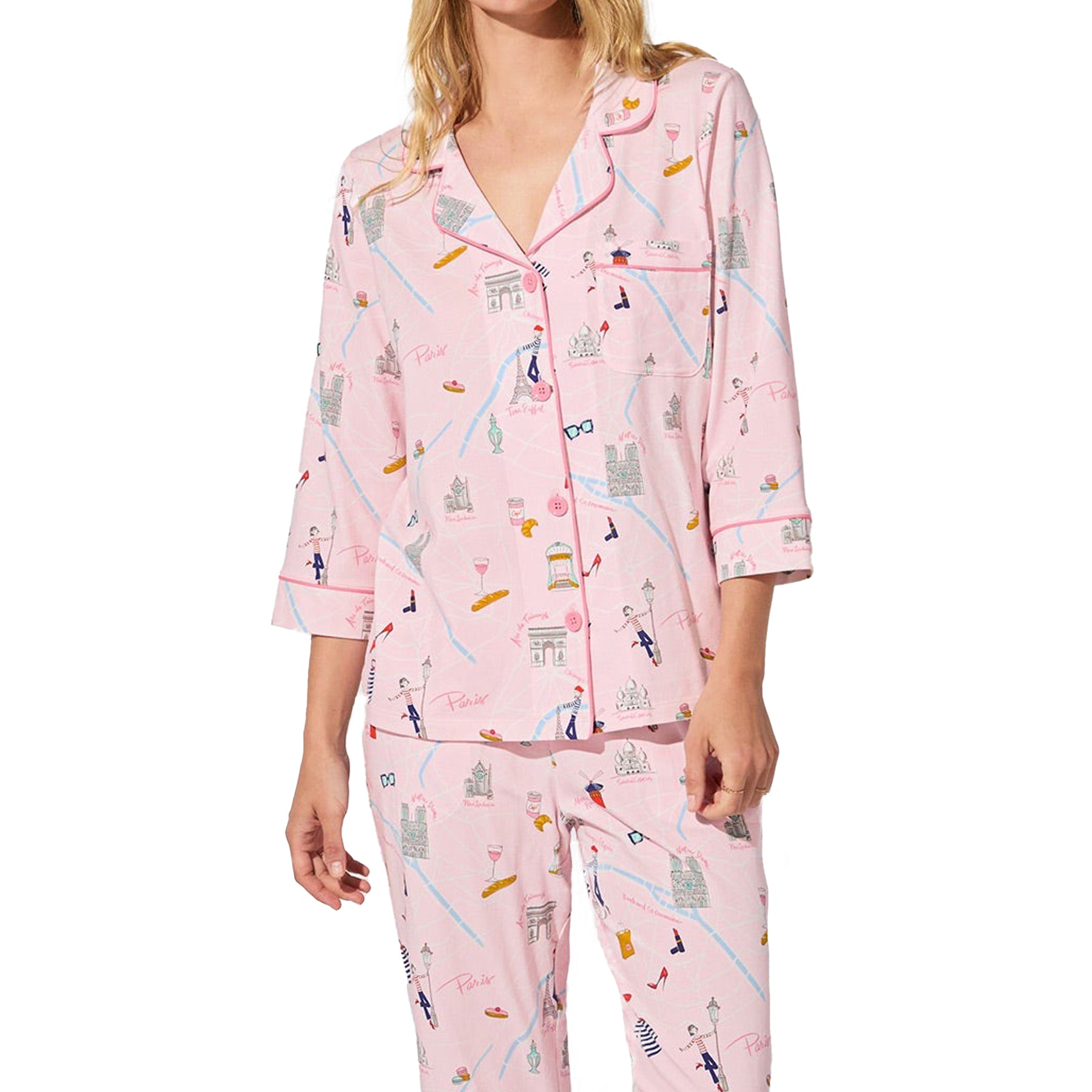 Front cropped view of straight-size model wearing pink Paris print pajama set with three-quarter sleeves and button-front top.