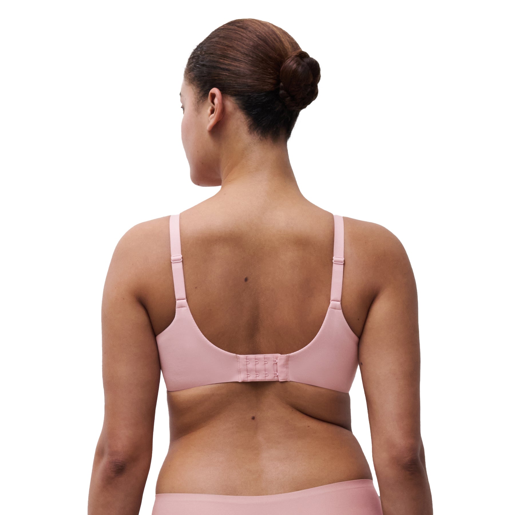 Back view of rose des sables lace bra featuring adjustable straps and hook-and-eye closure