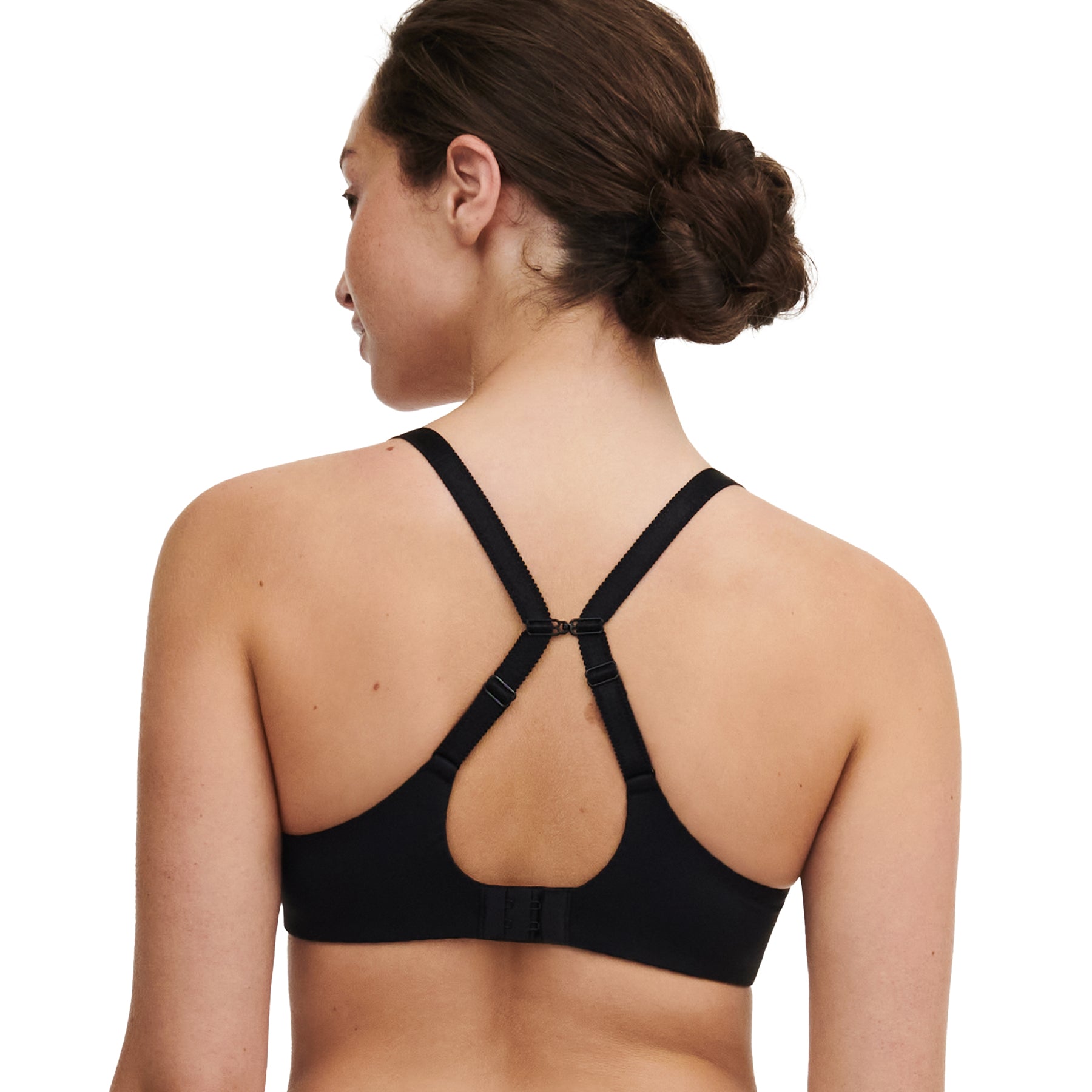 Back view of model wearing black plunge bra with racerback strap option.