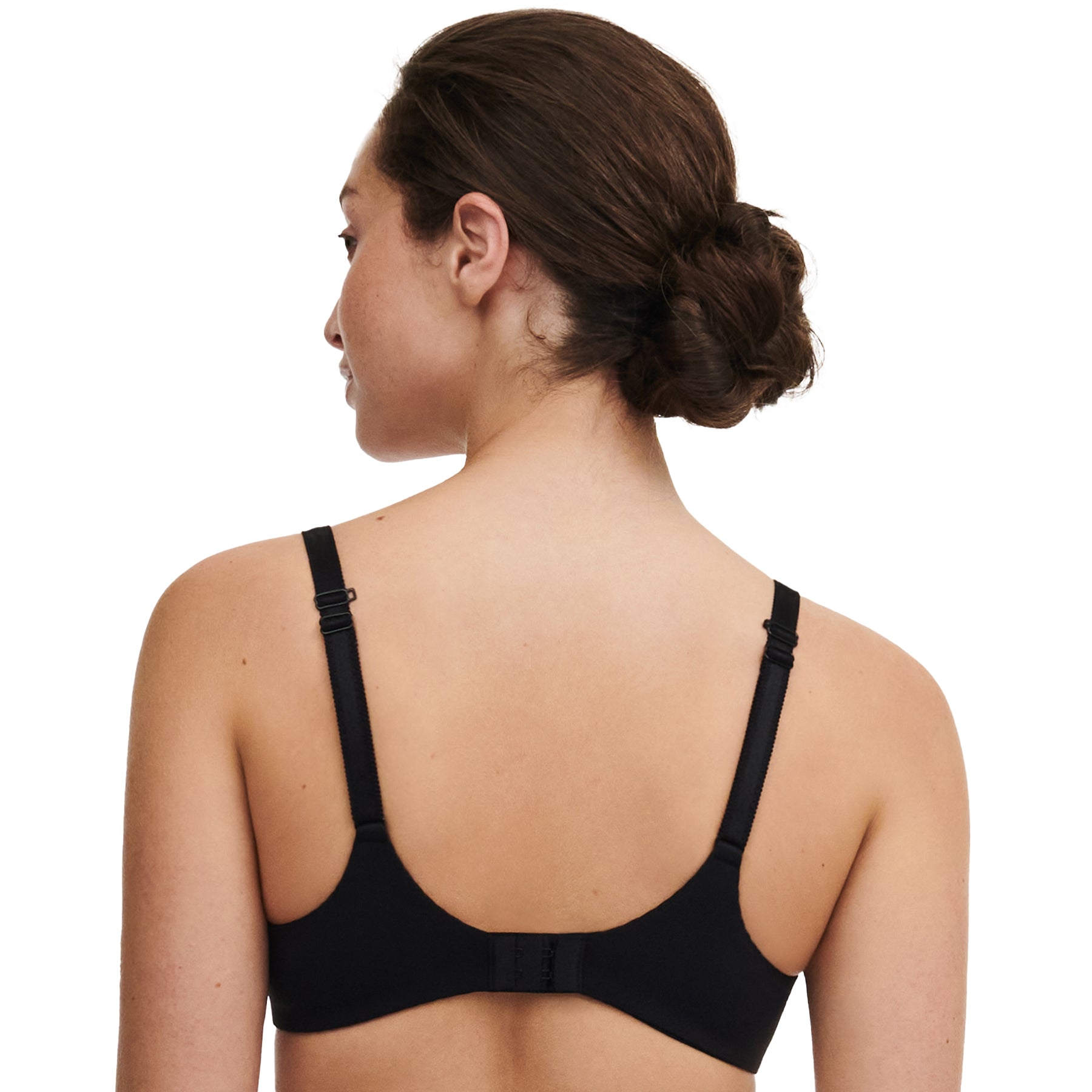 Back view of model wearing black plunge bra with traditional strap style.