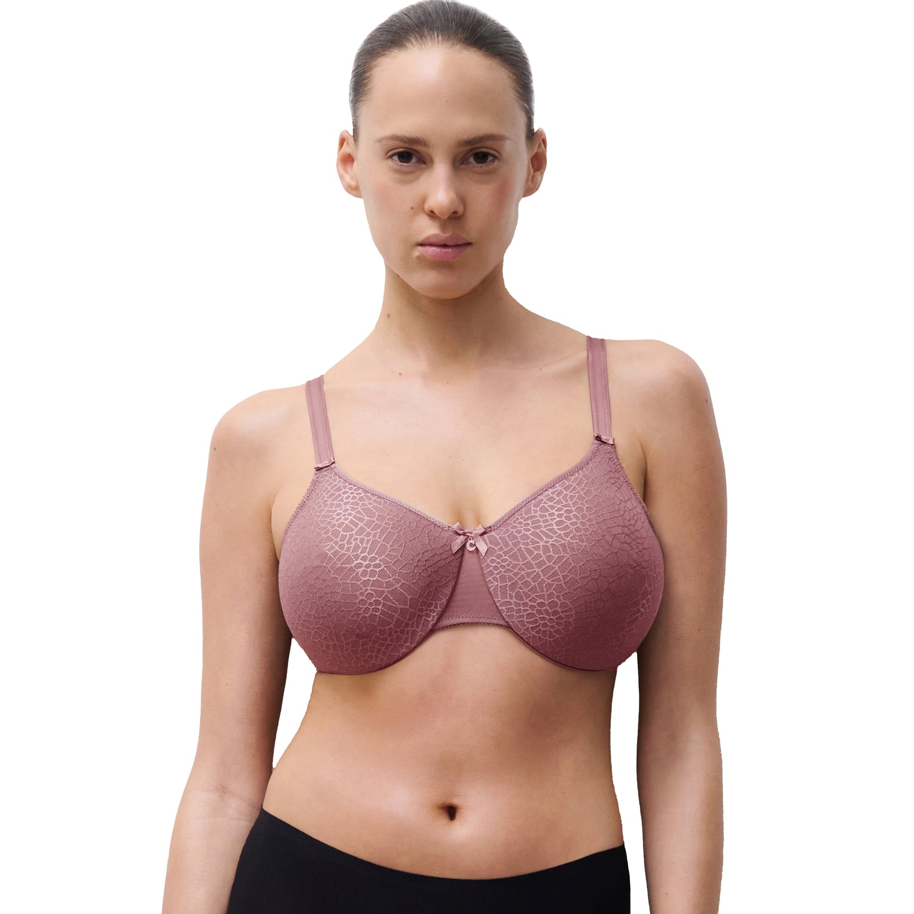 Woman wearing a pink bra on a white background