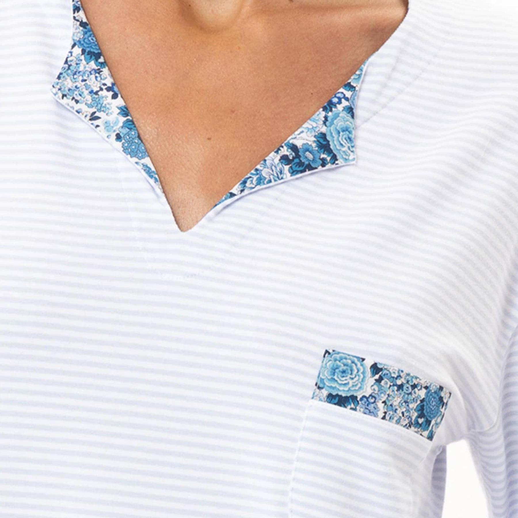 Detail of blue floral cuff on white and blue stripe three-quarter sleeve nightdress
