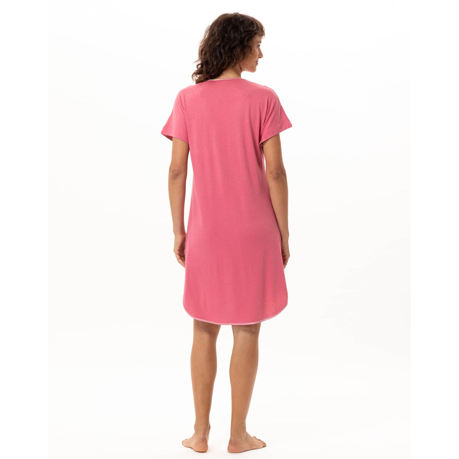 Back view of fraise pink knee-length nightgown with short sleeves and curved hemline