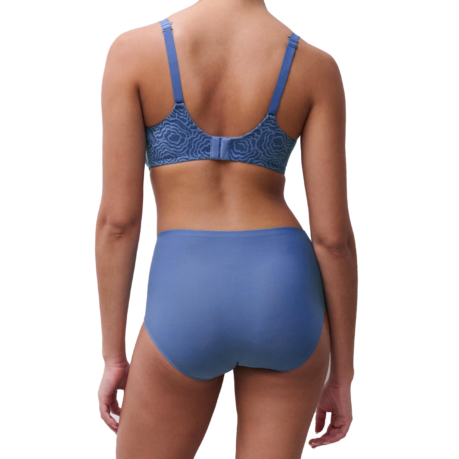 Back view of ocean blue seamless full-coverage briefs paired with a matching patterned bra