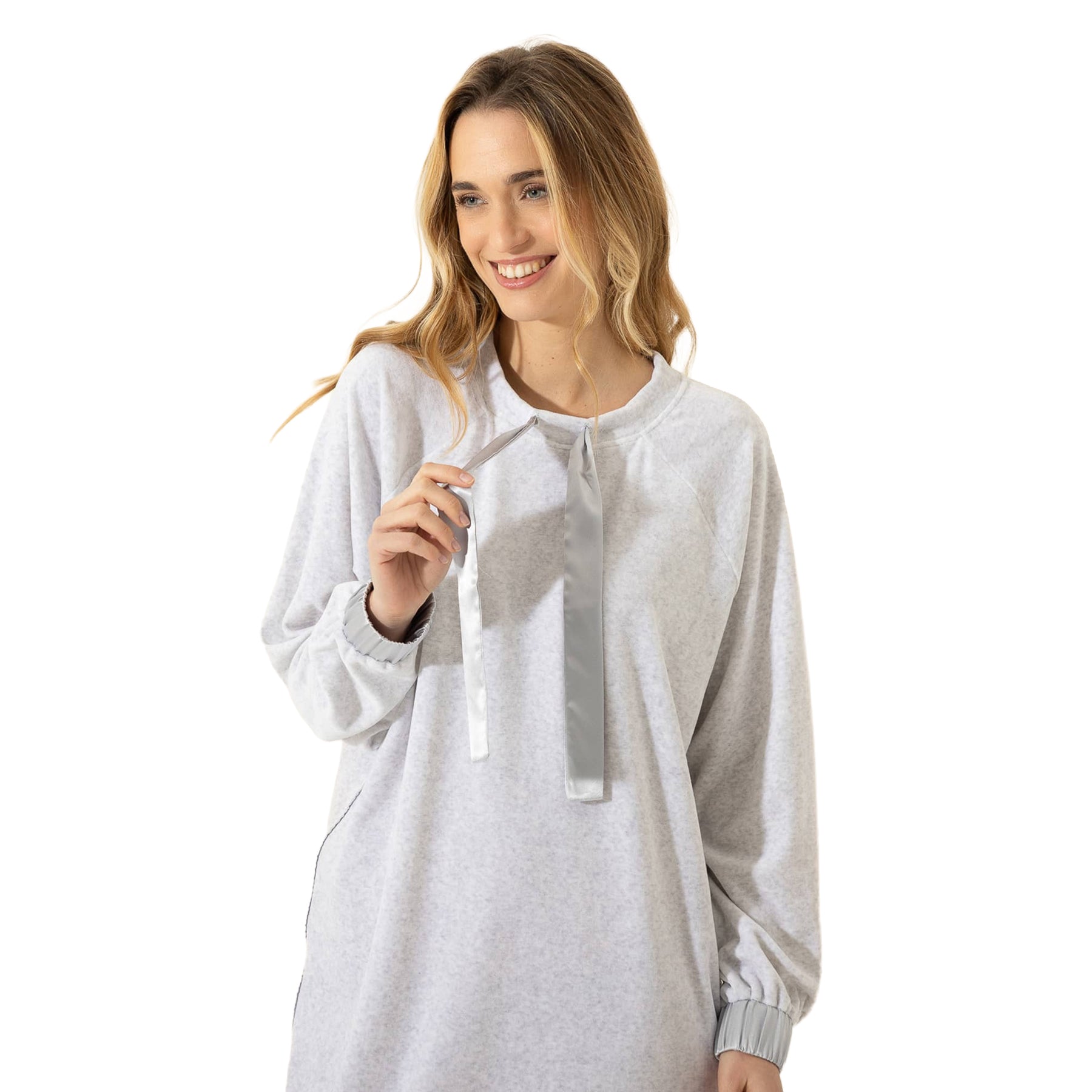 Close-up of woman modeling a light grey sleep shirt featuring a soft round neckline, long satin tie detail, and elasticated cuffs.