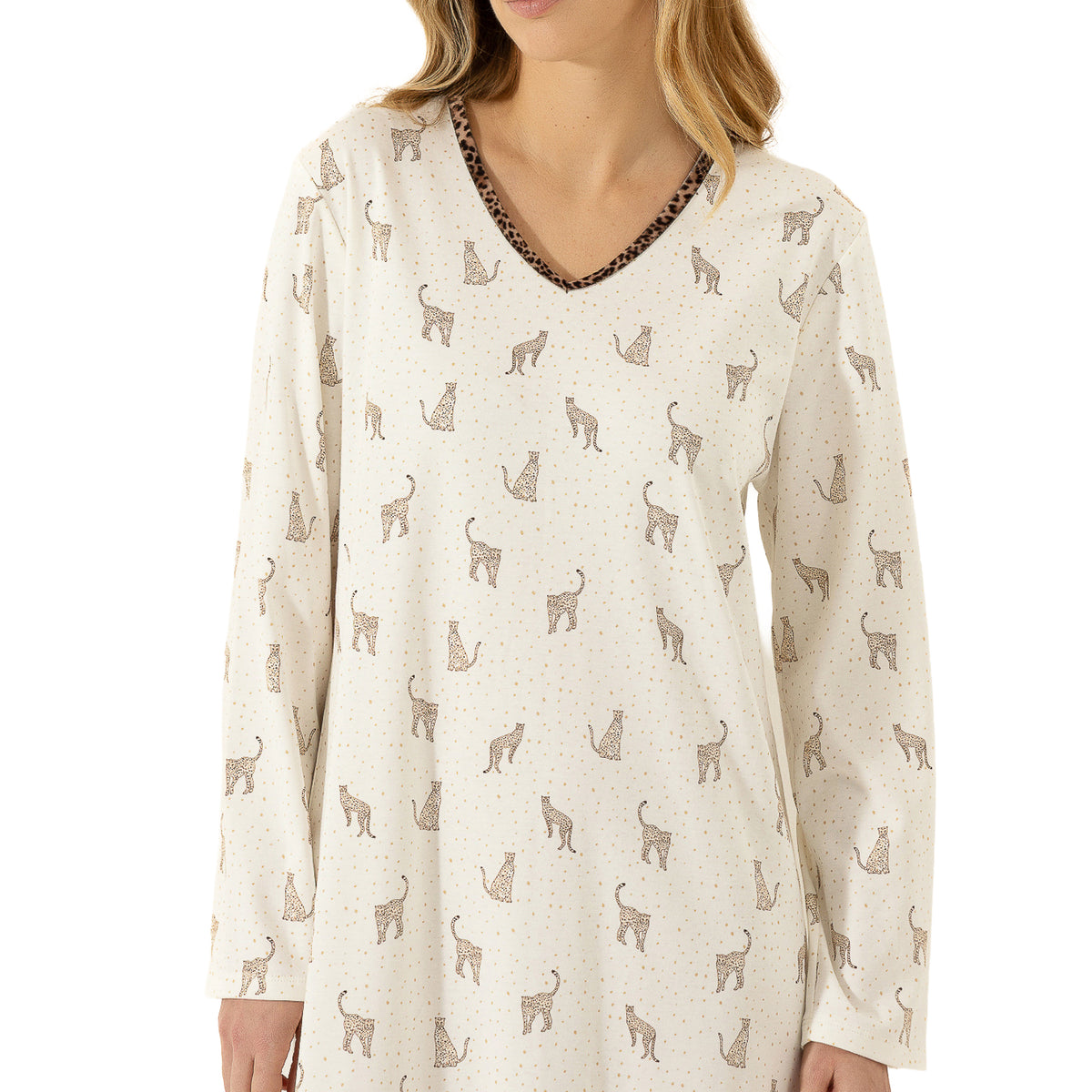 Close-up of ivory leopard-print nightgown showing the V-neckline, long sleeves and contrasting animal-print trim.