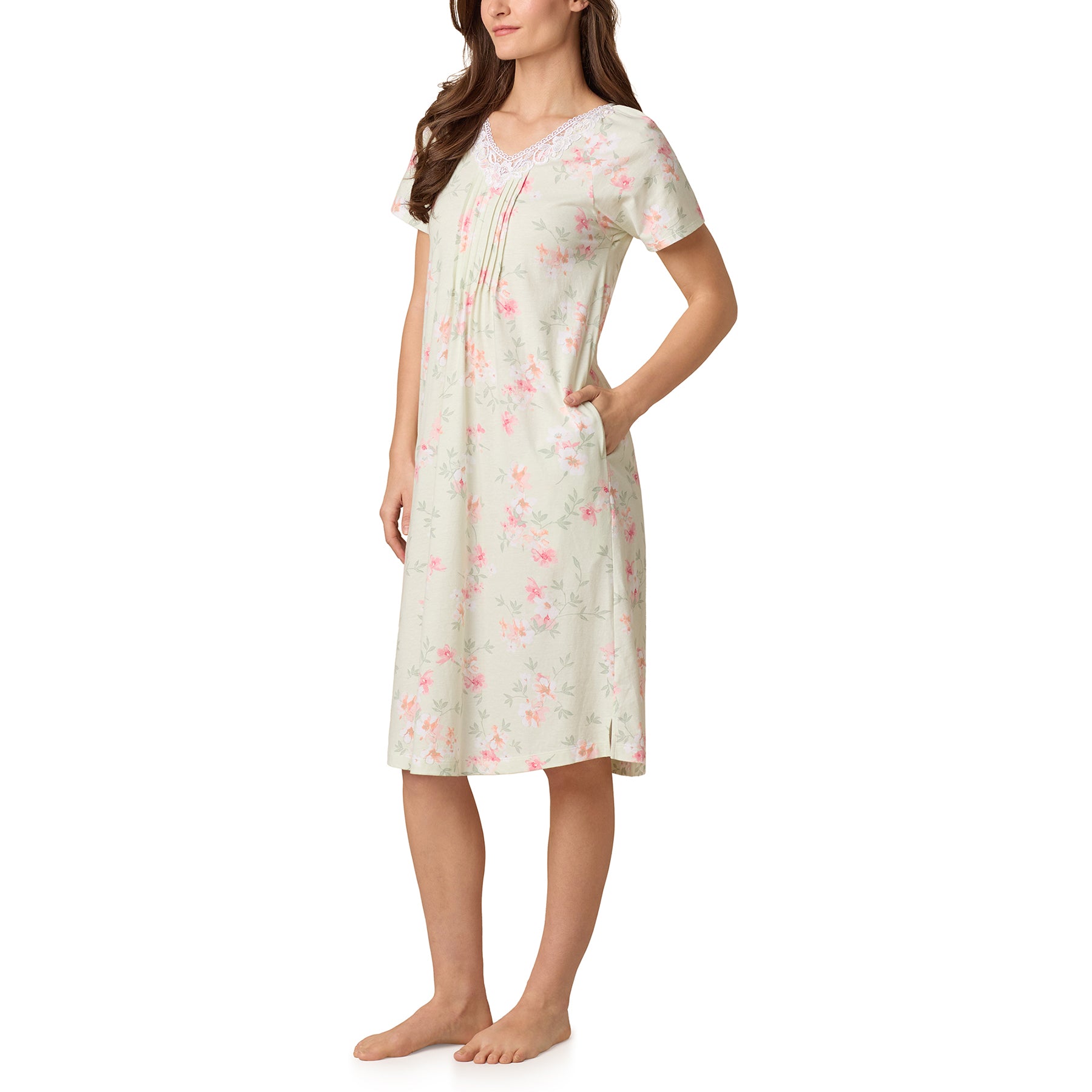 Side view of cotton floral nightgown with pockets and pintuck pleats