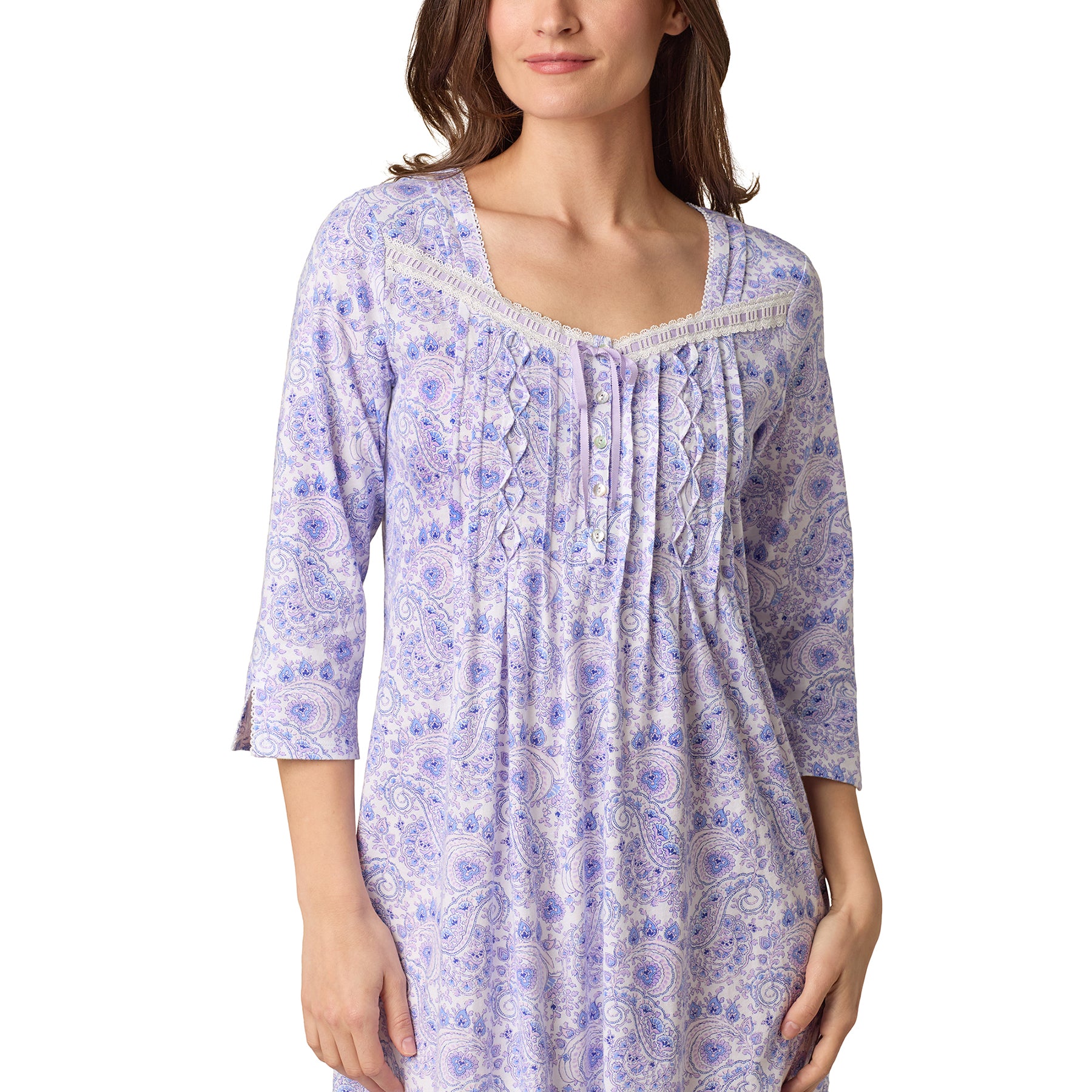 Detail of the V-neckline, pleating, and lace trim on purple-blue paisley Carole Hochman ballet gown.