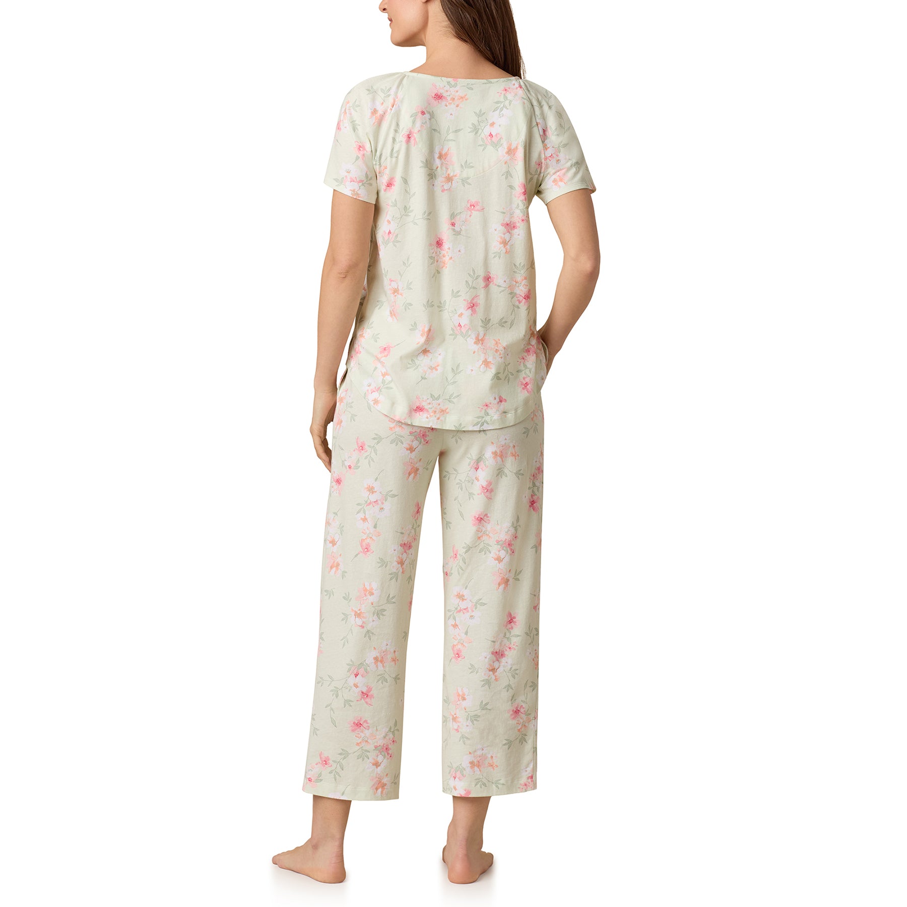 Woman in Green Garden print sleepwear set - back view showing short sleeves and capri pants