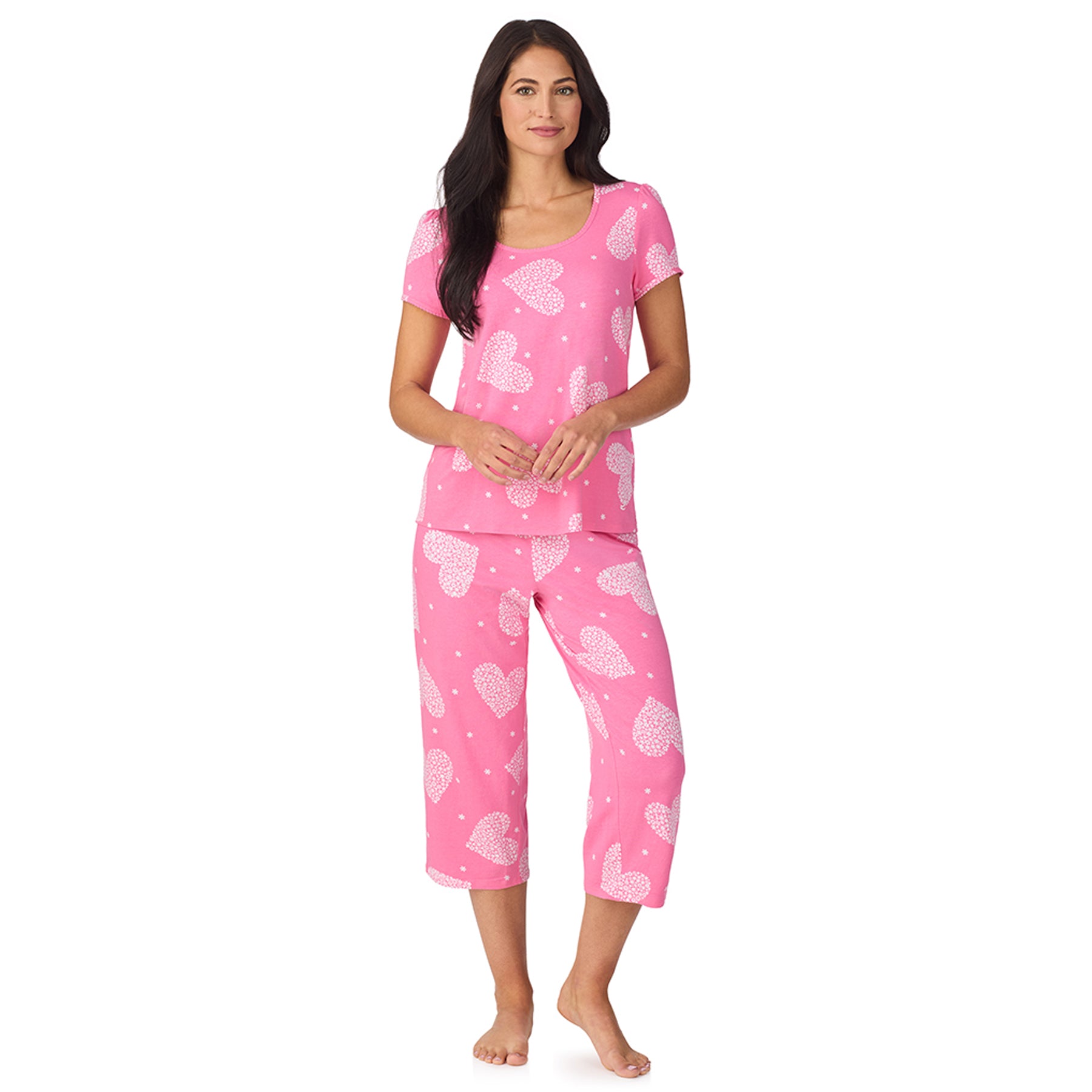 Front view of women’s pink heart print pyjama set with short sleeve top and cropped pants