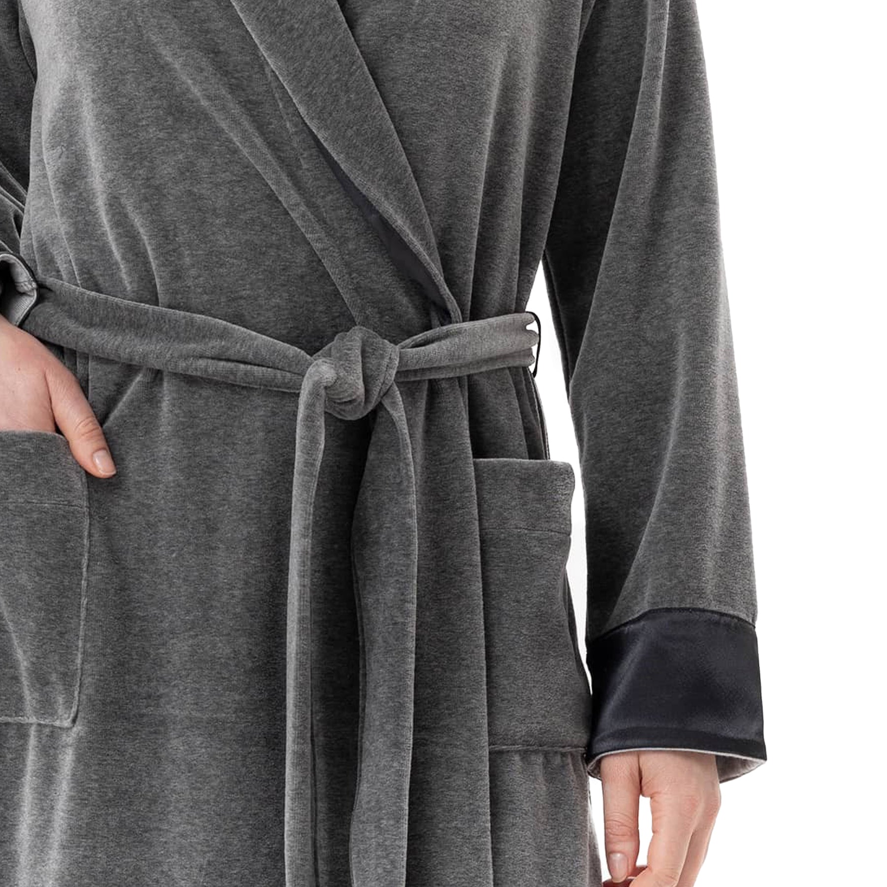 Close-up of waist tie and pockets on grey velour robe with satin cuff detail.