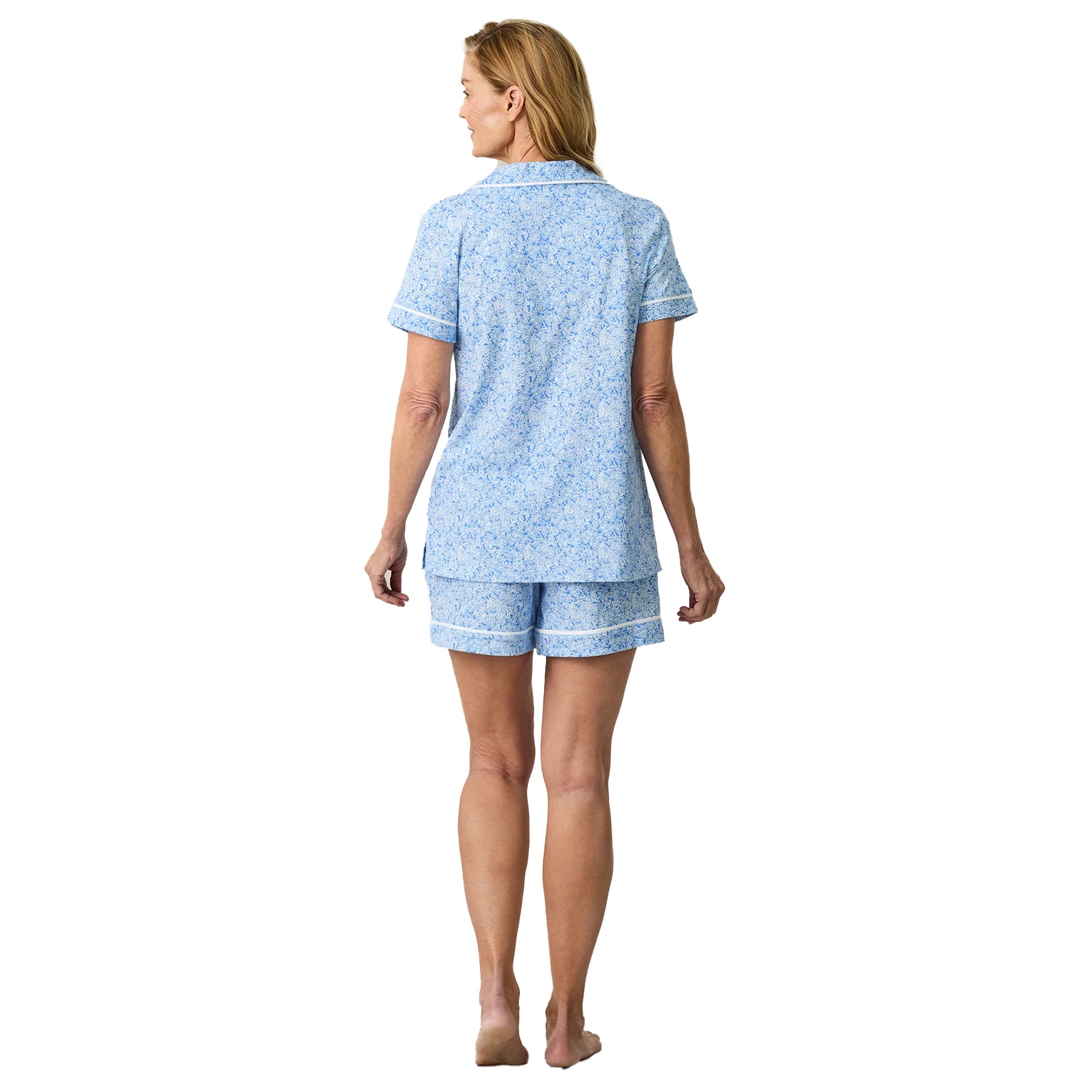 Blue floral short pyjama set with relaxed button-front top and matching shorts, back view.