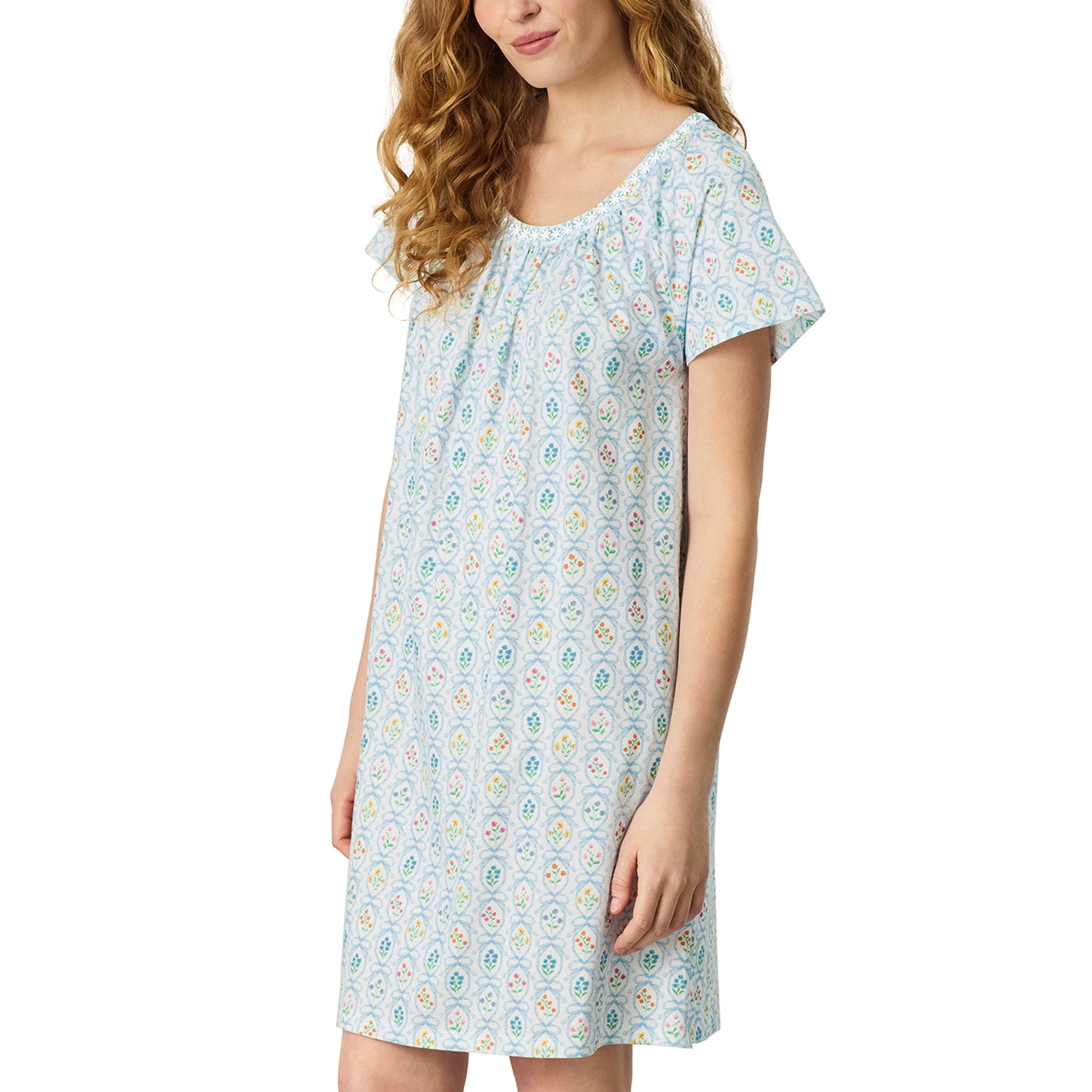 Side view of ivory floral nightgown with soft drape and lightweight fabric for breathable comfort