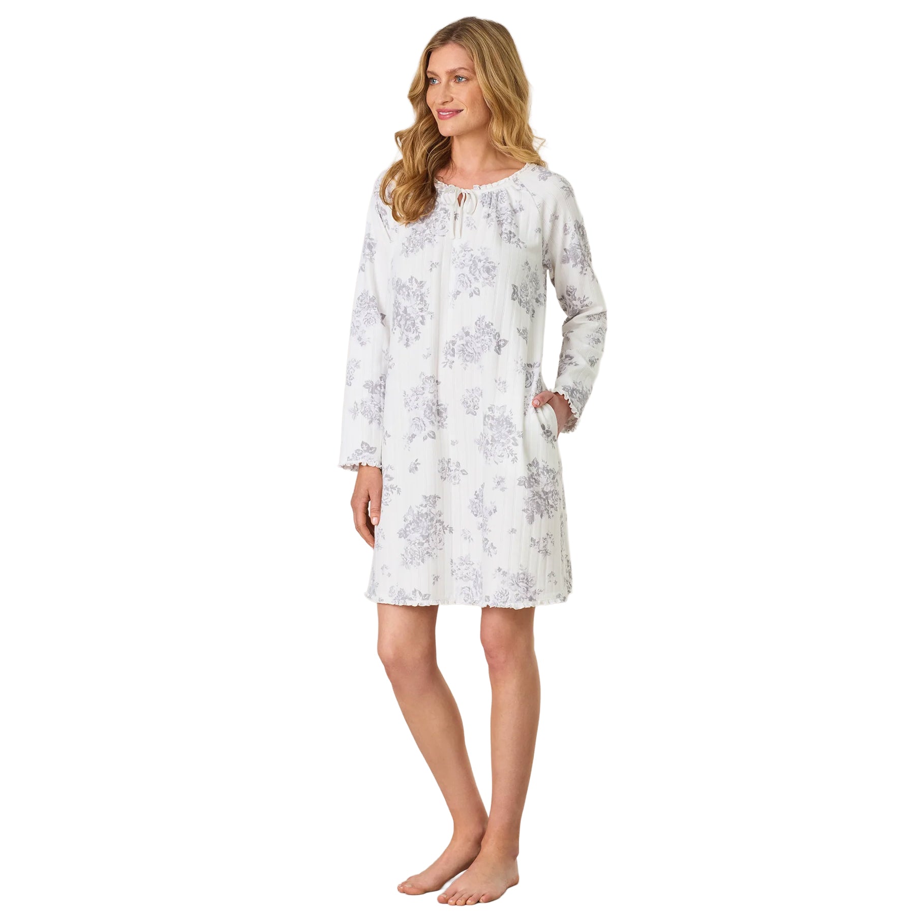 Front view of a white and grey floral nightgown with long sleeves, relaxed fit and softly gathered round neckline.