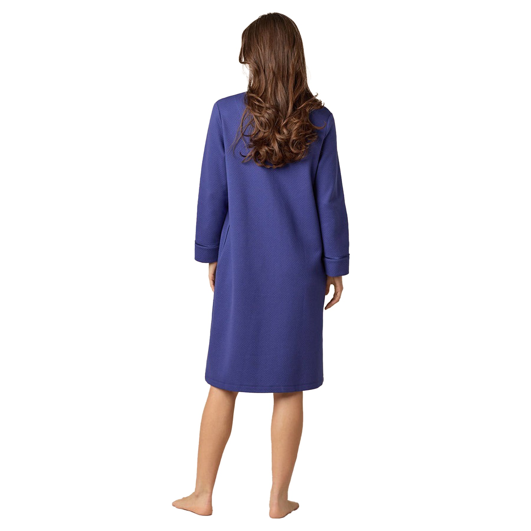 Person wearing a blue robe from behind on a white background