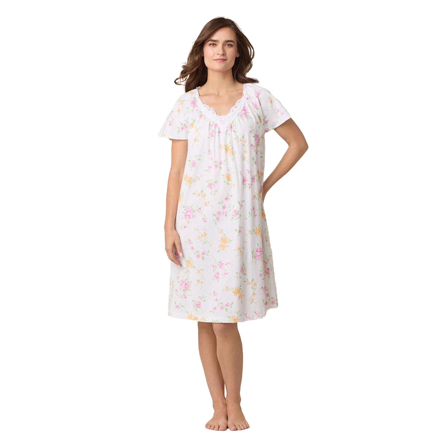 Front view of a woman wearing a white short-sleeve floral nightgown with lace trim at the neckline.