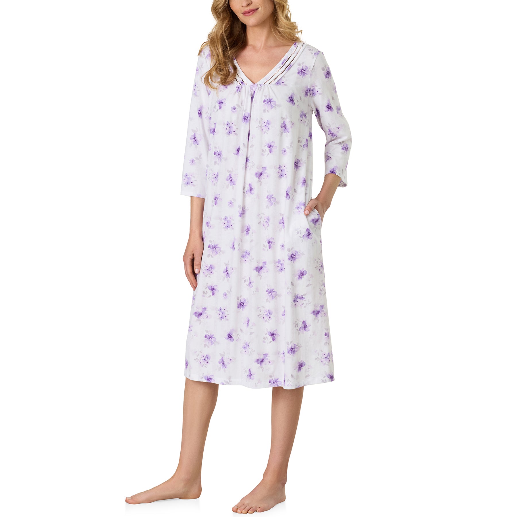 Angled front view of the Carole Hochman floral nightgown showcasing the flowing silhouette, feminine V-neckline, and soft lavender blossom print.