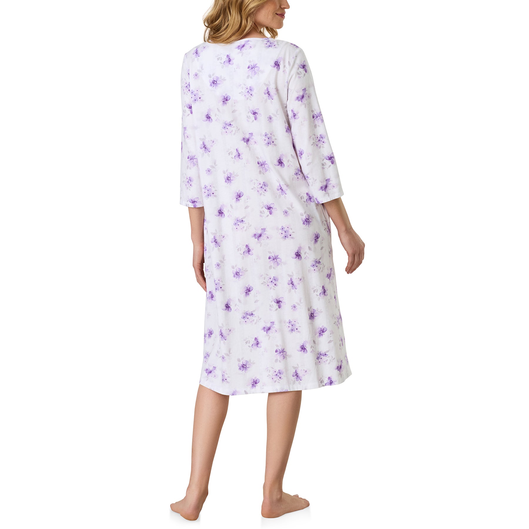 Back view of the Carole Hochman long sleeve nightgown featuring a relaxed, mid-calf length silhouette with an elegant lavender floral print on a soft white background.