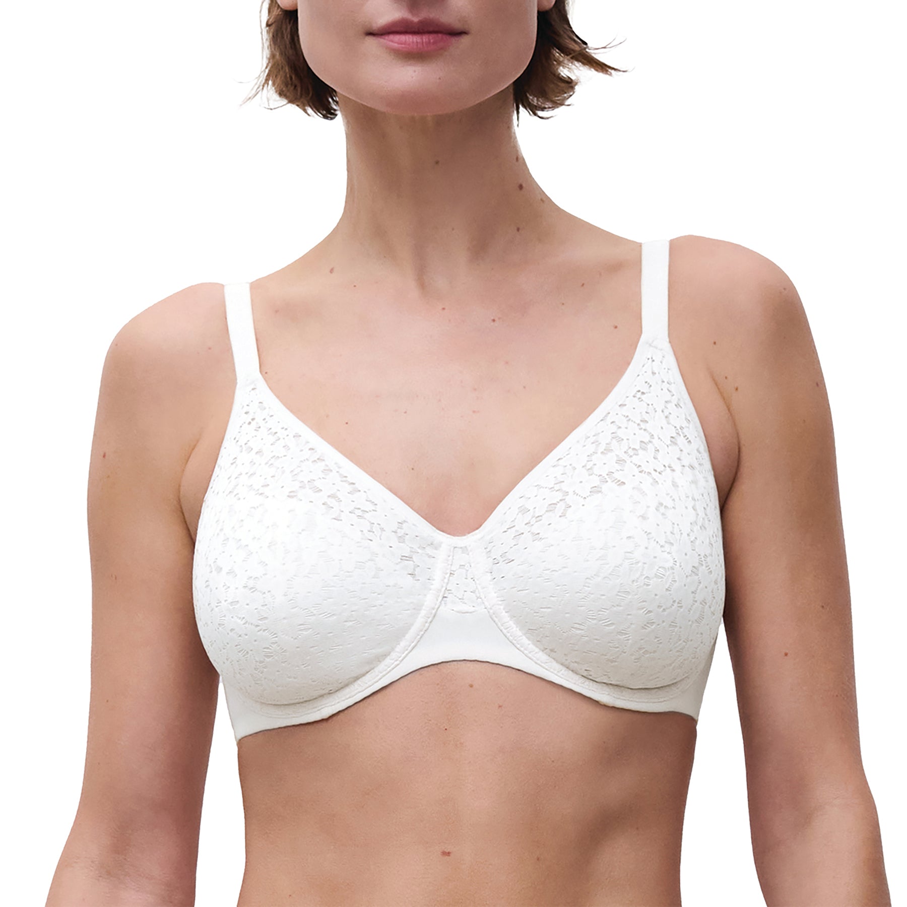 Front view of woman wearing Chantelle Norah Full Cup Bra in white with floral lace detailing and underwire support.