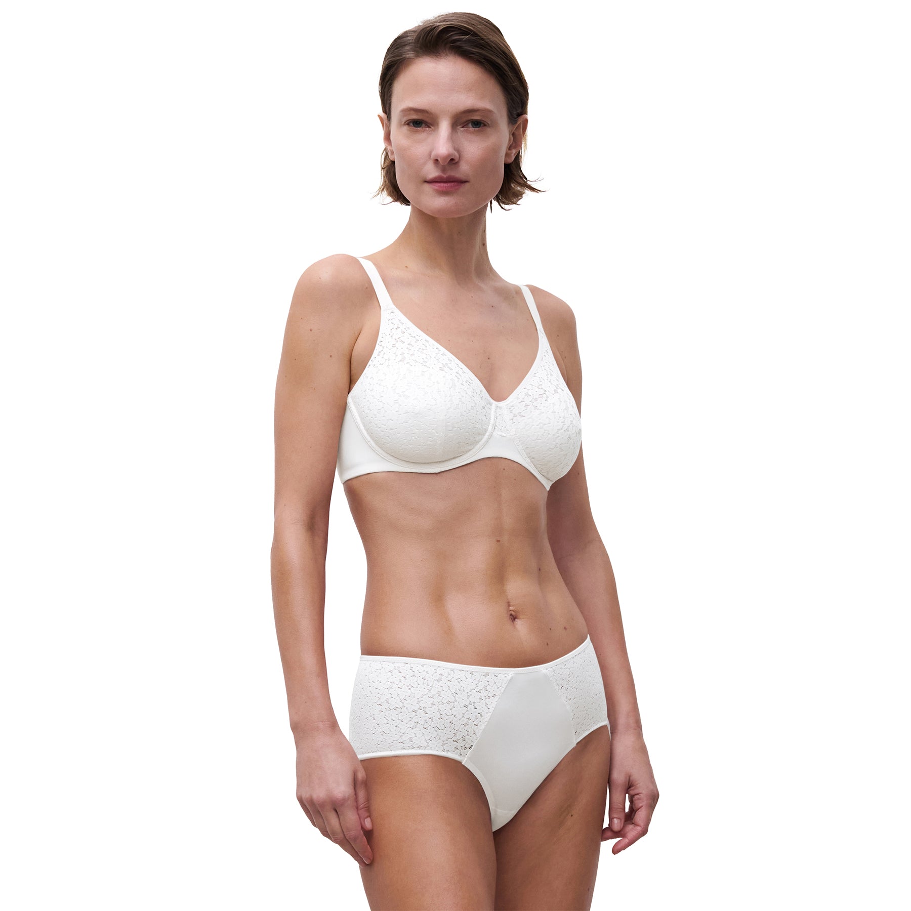 Woman wearing Chantelle Norah Full Cup Bra and matching white brief with lace details, showcasing full set.