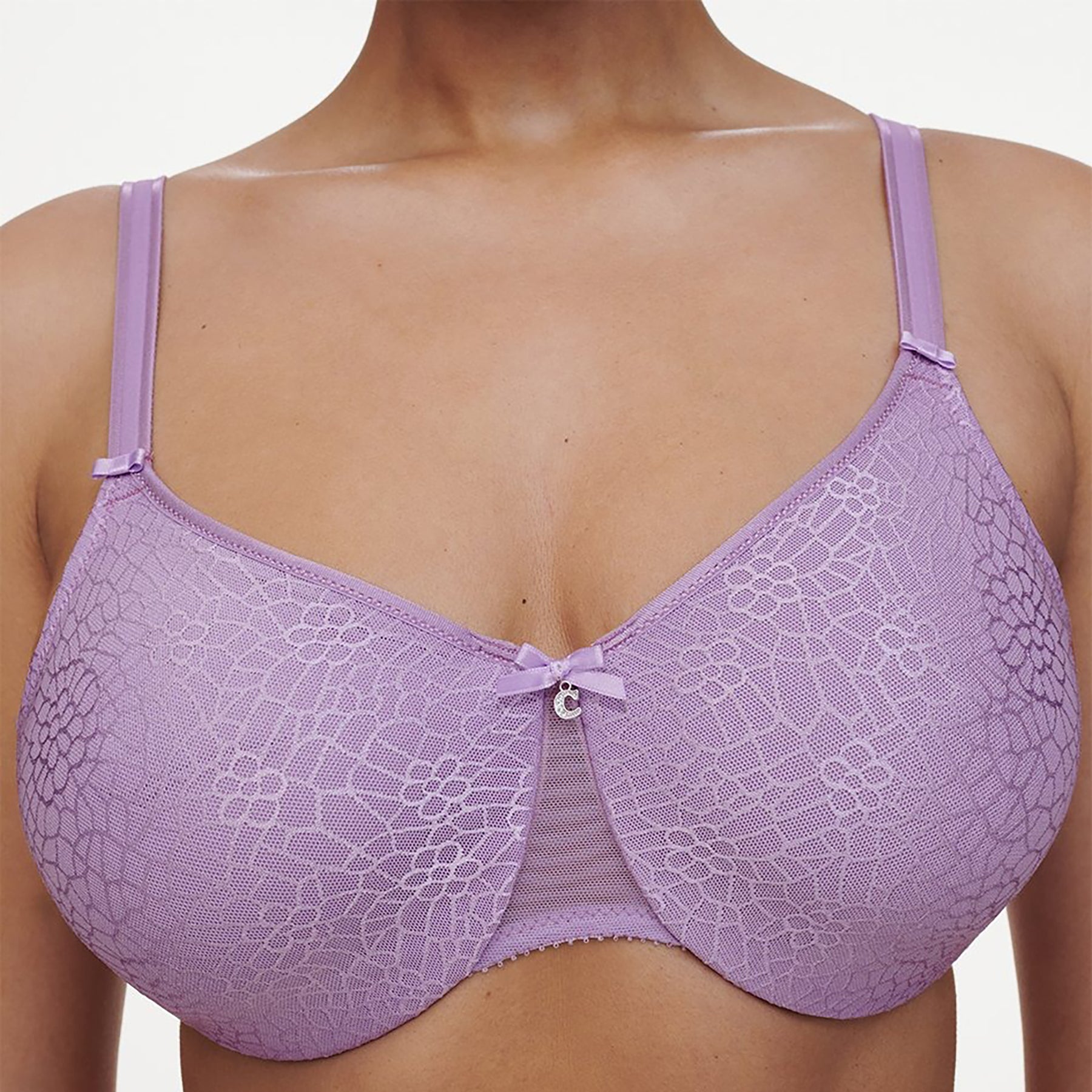 Close-up of Chantelle lavender bra with floral lace detail and satin bow