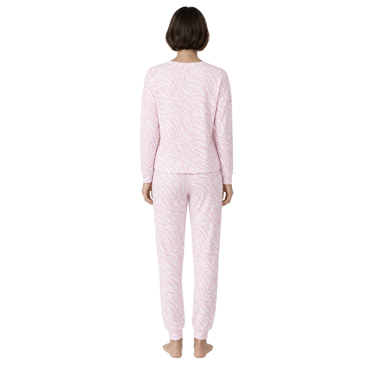 Light pink and white zebra print pajama set featuring a relaxed long-sleeve top and matching cuffed jogger pants, back view.