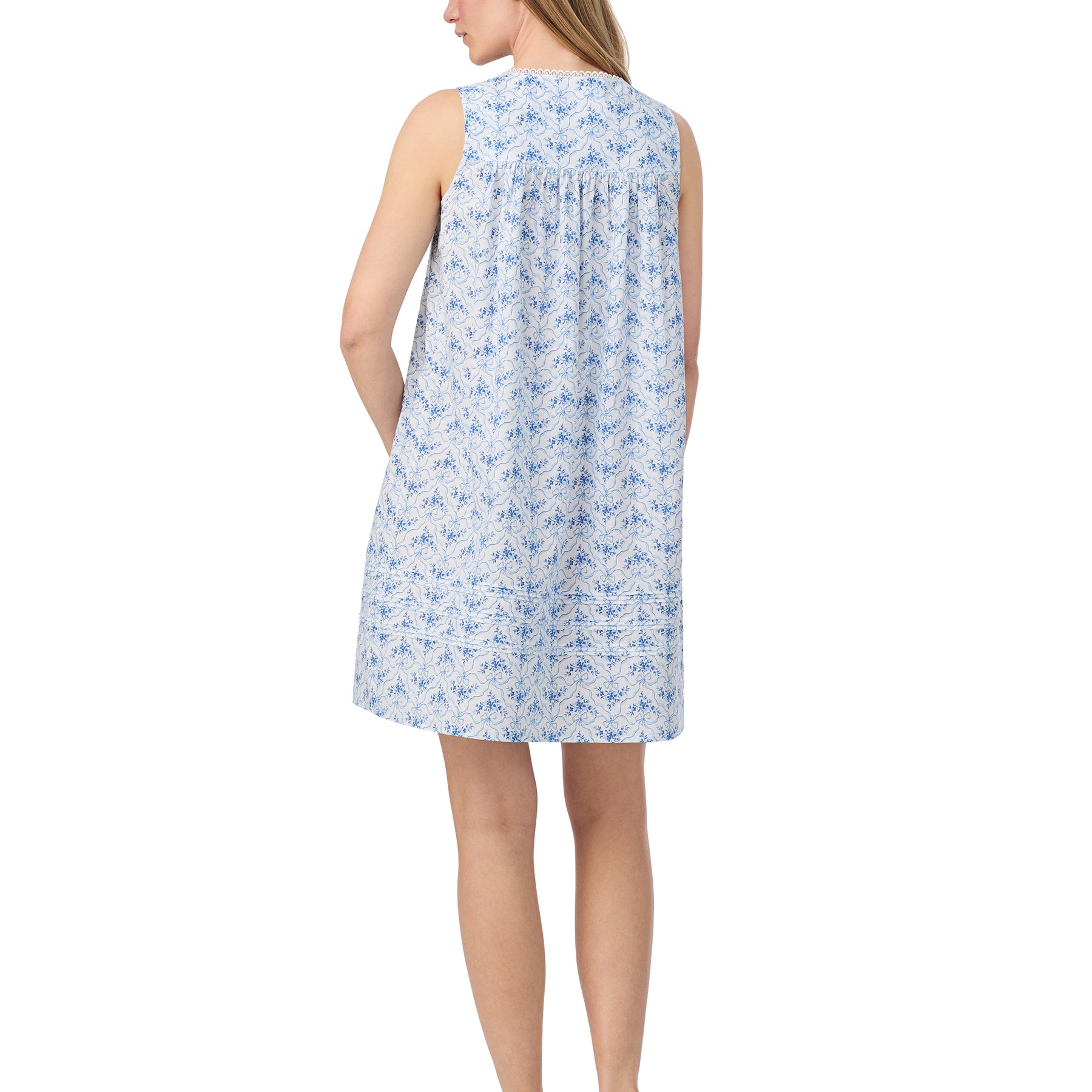 Back view of sleeveless cotton nightgown with blue floral print and gathered yoke by Eileen West.