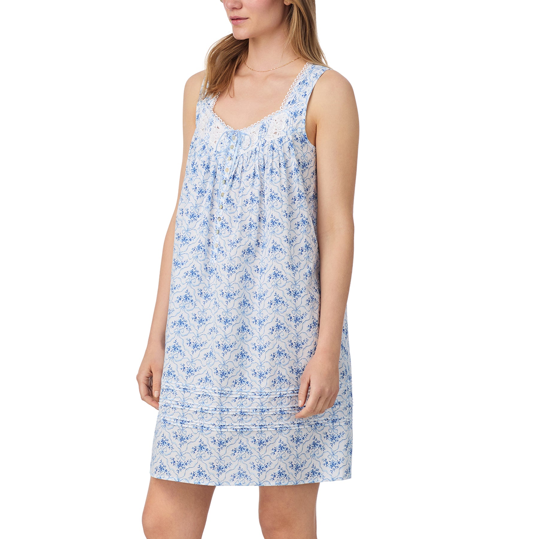 Side view of blue and white floral cotton nightgown featuring soft gathers and lace details.