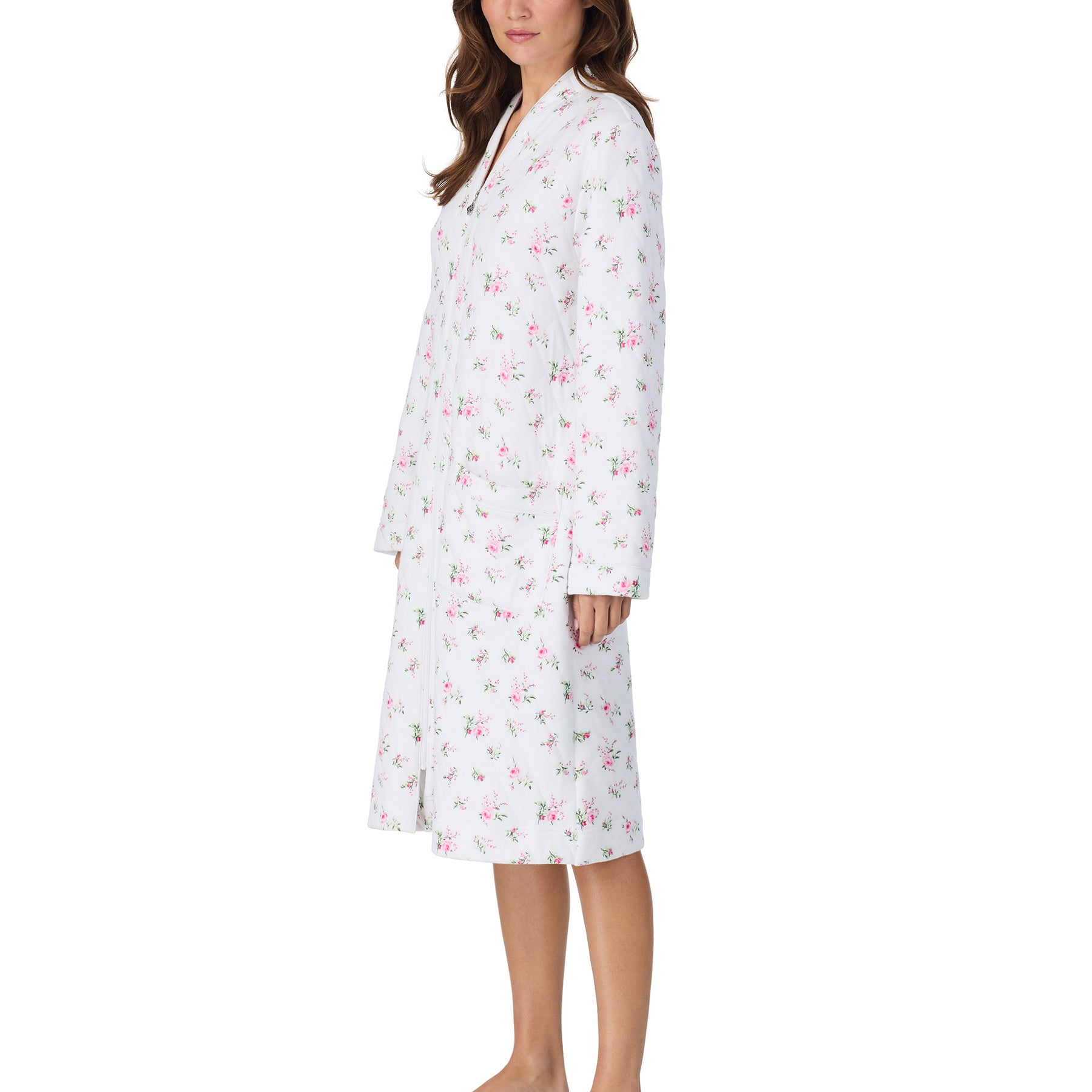 Side view of a white quilted robe showing the relaxed fit, long sleeves, and delicate pink floral print.