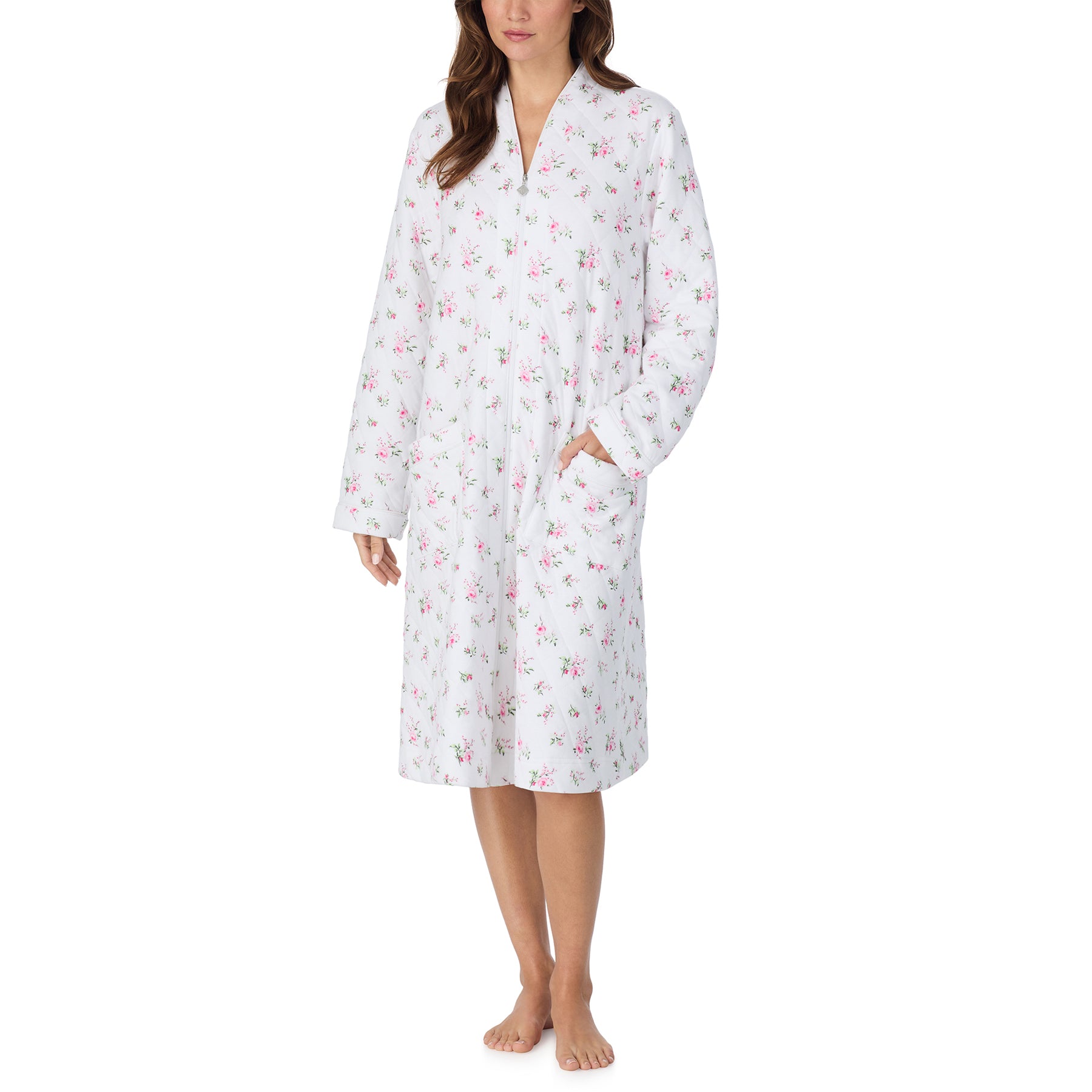 Front view of the white quilted floral robe highlighting the zip closure, soft quilting, and practical front pockets.