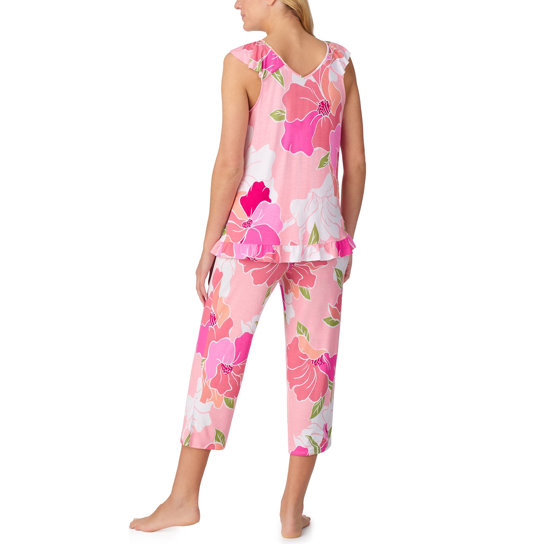 Back view of the pink floral pyjama set featuring a ruffled hem top and relaxed capri pants.