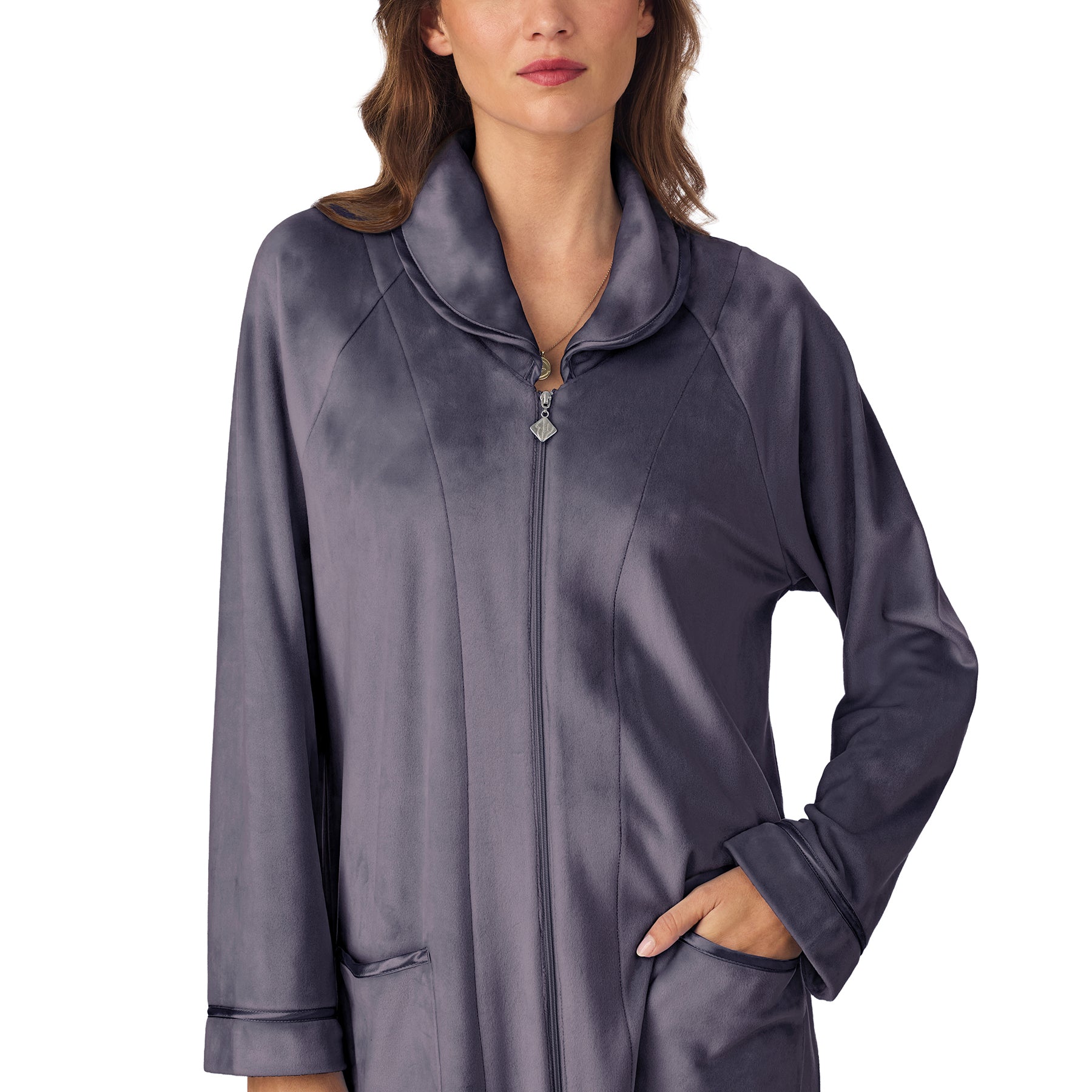 Close-up of charcoal velour robe showing soft collar, zipper, and pocket trim details.