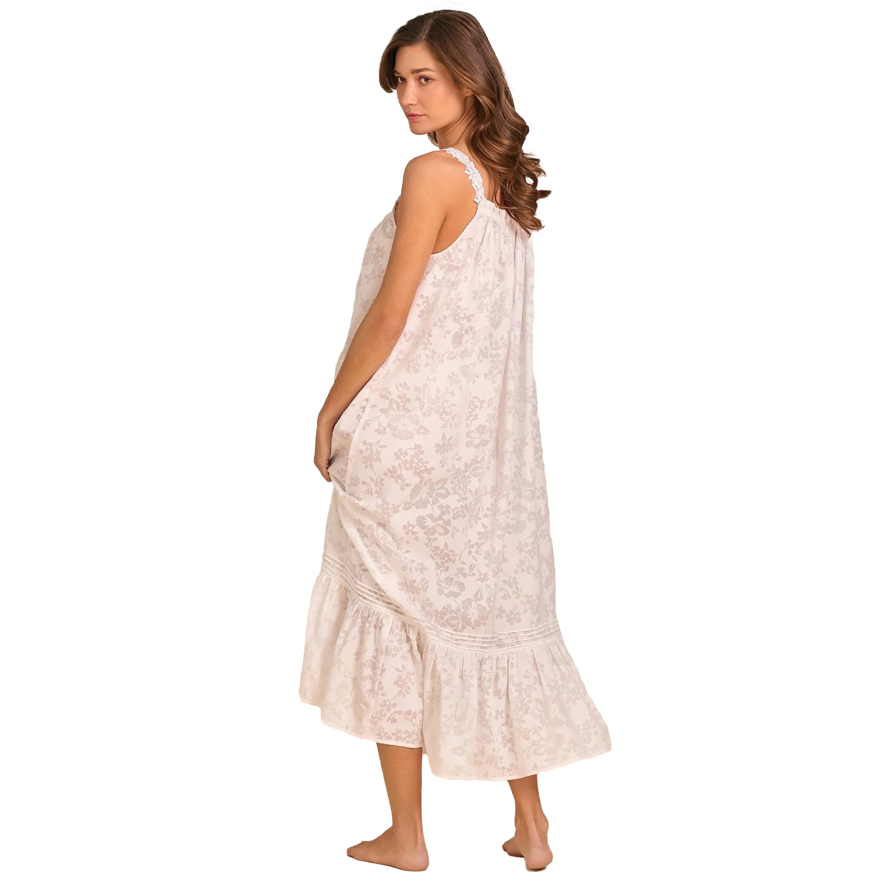 Side/back view of mid-length cotton nightgown in blush floral print featuring lace straps and ruffled hem detail