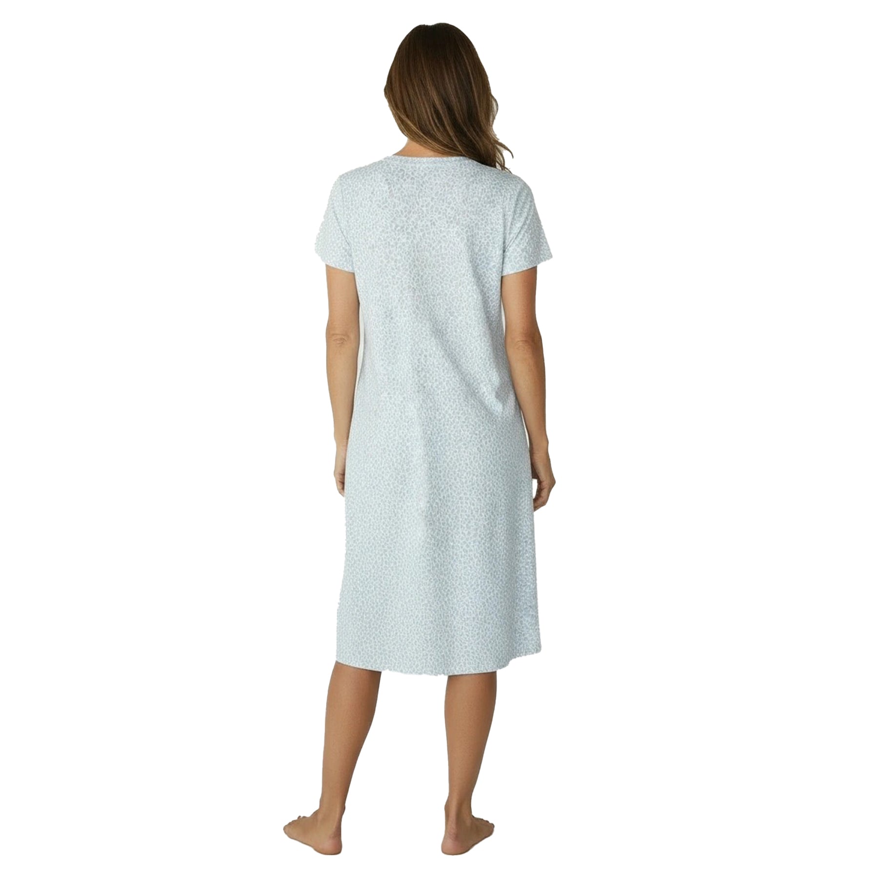 Woman wearing a light blue nightgown on a white background
